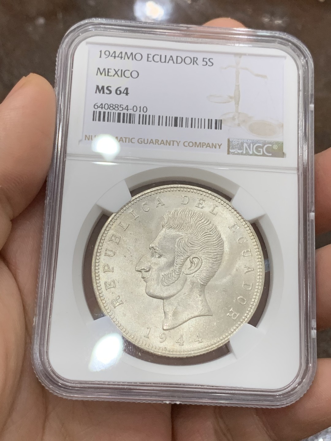 《竞宝斋》第116场-周日，周一 ，2场连拍（全场包邮） NGC MS64 厄瓜多尔1944年5苏克雷大银币