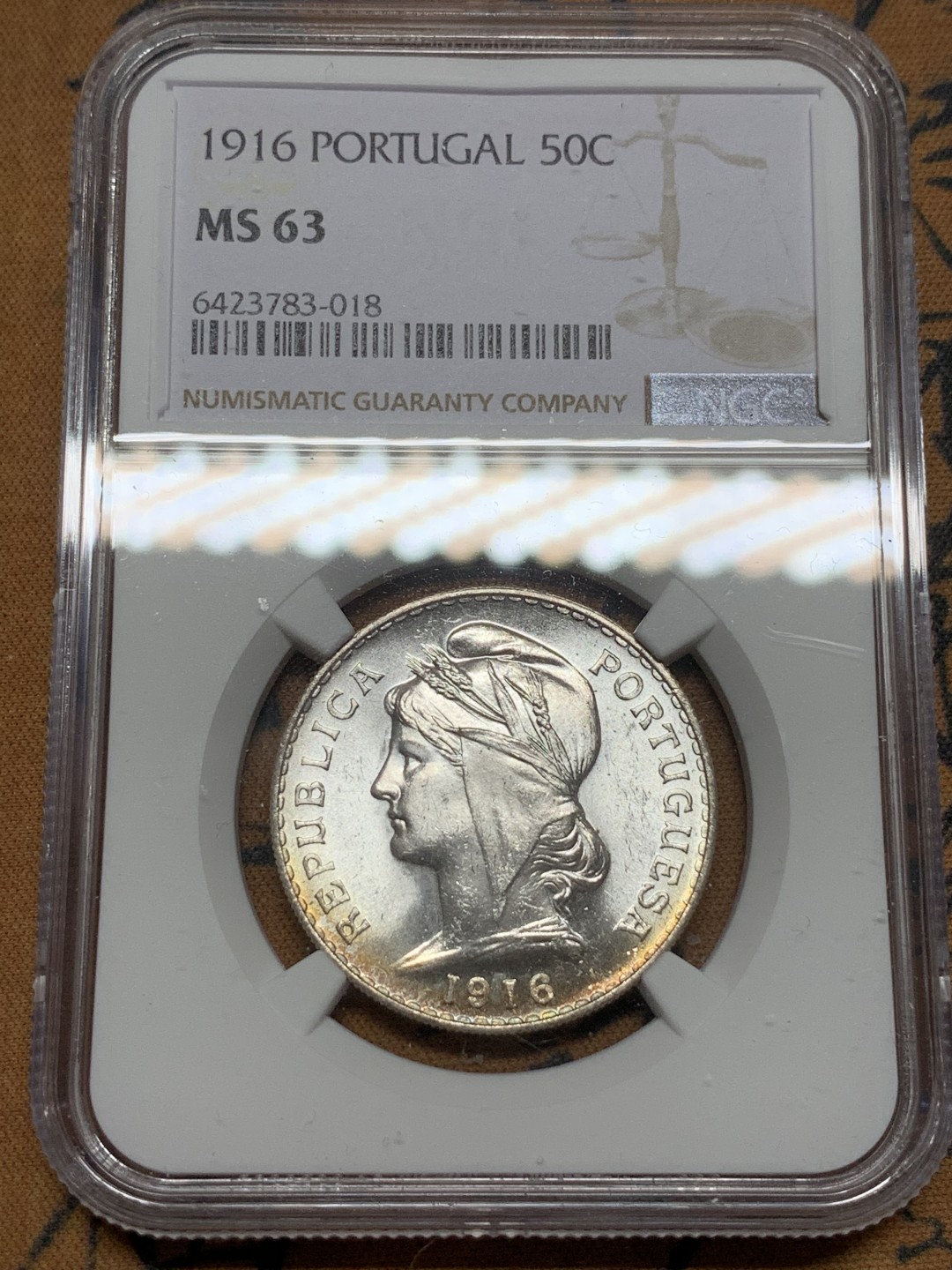 《竞宝斋》第116场-周日，周一 ，2场连拍（全场包邮） NGC-MS63 葡萄牙1916年 自由女神半圆银币 顶级车轮转光