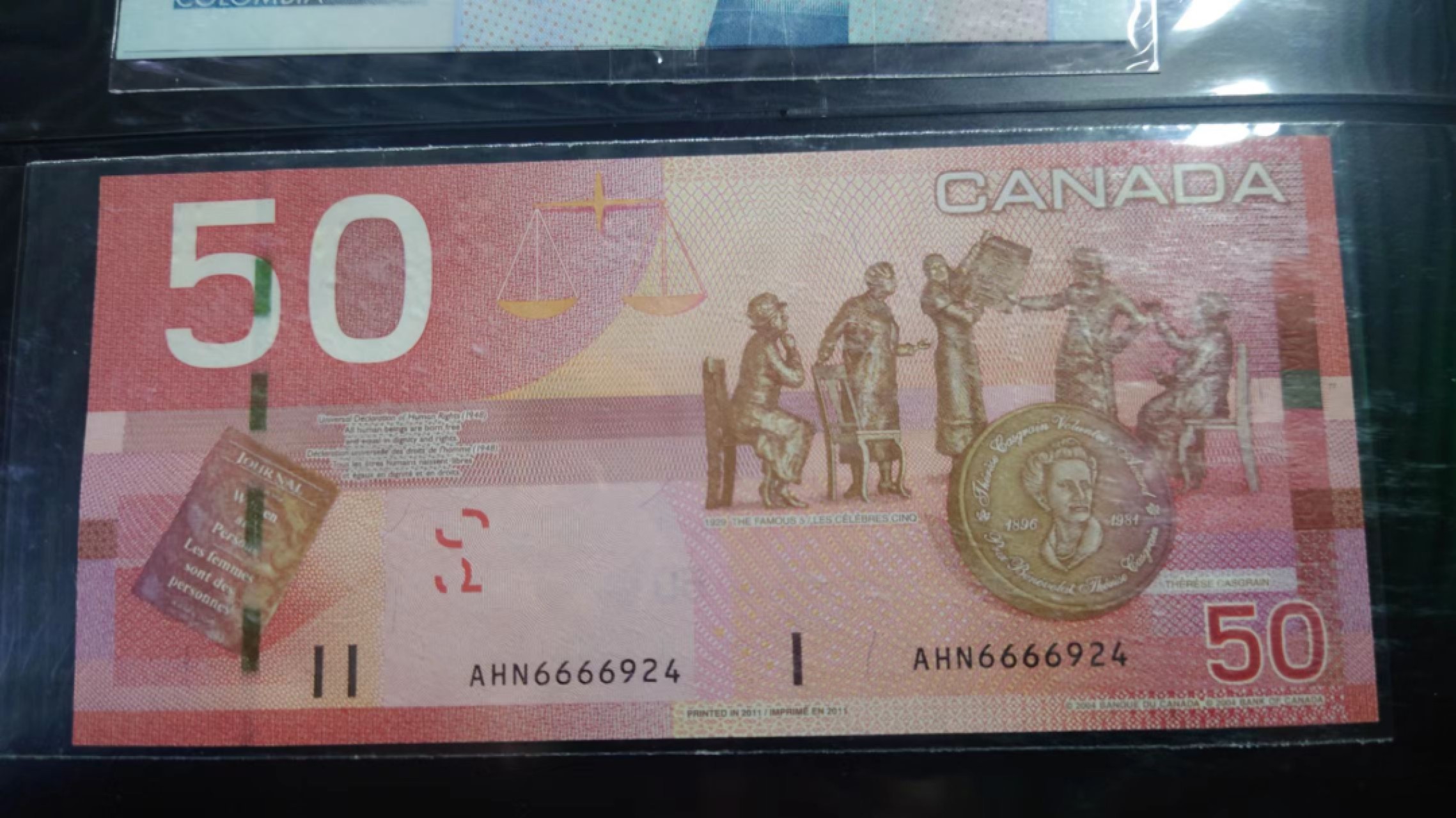 今晚八点半【世界钱币收藏】总50期暨2022年第七期 裸钞评级混合场（月底的第八期有新品澳门品种敬请关注) 2011年加拿大旅版50元 尾4 全新绝品刀拆