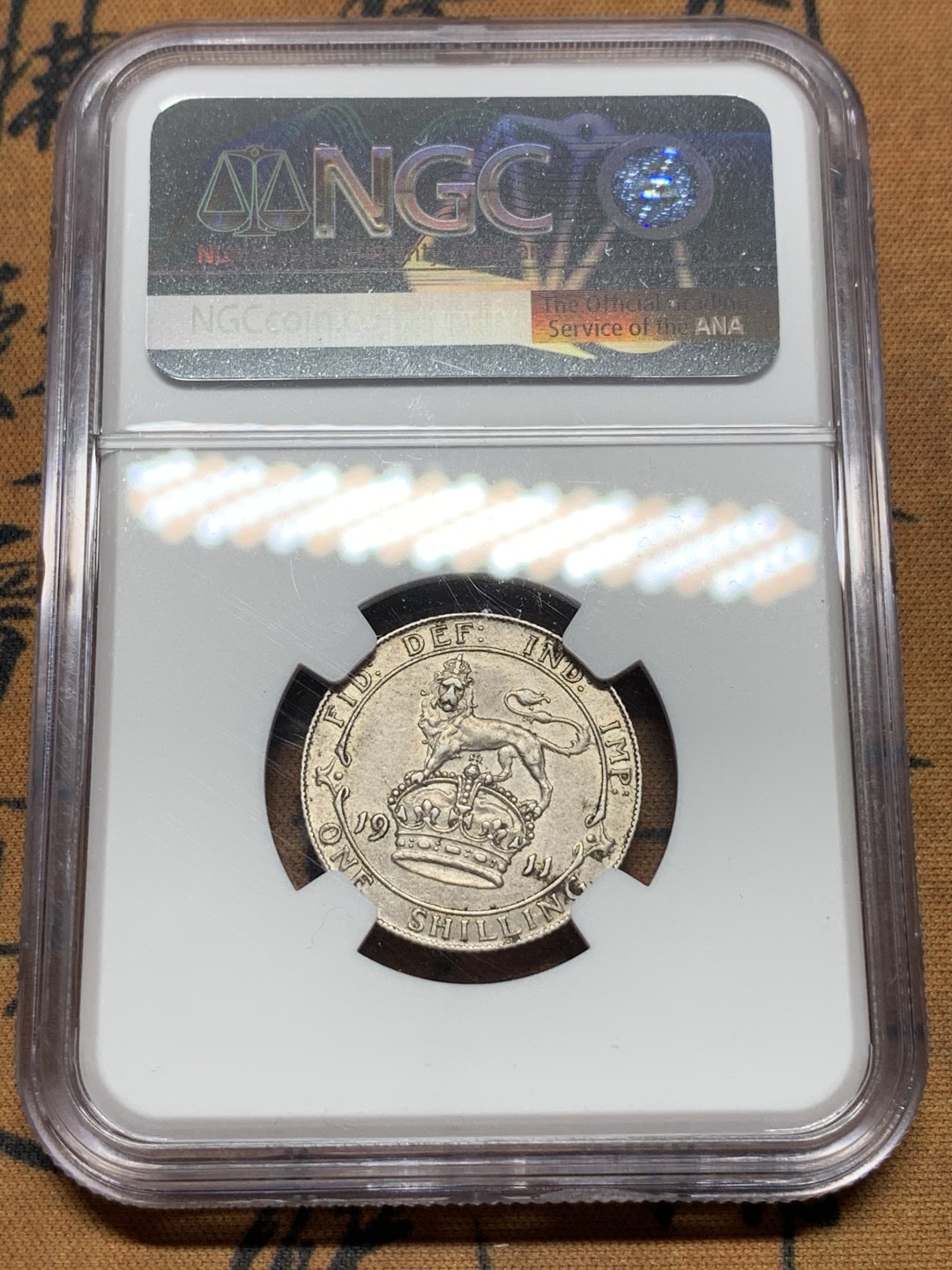 《竞宝斋》第116场-周日，周一 ，2场连拍（全场包邮） NGC AU58 英国 1911年乔治 五世 1先令铜币 原味包浆带底光 925高银版本