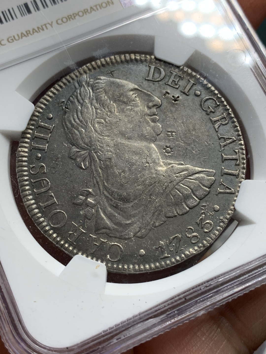 《竞宝斋》第116场-周日，周一 ，2场连拍（全场包邮） NGC AU 评级 墨西哥 1783年 卡三 8R 双柱 大银币 打制细节都不错，有小戳