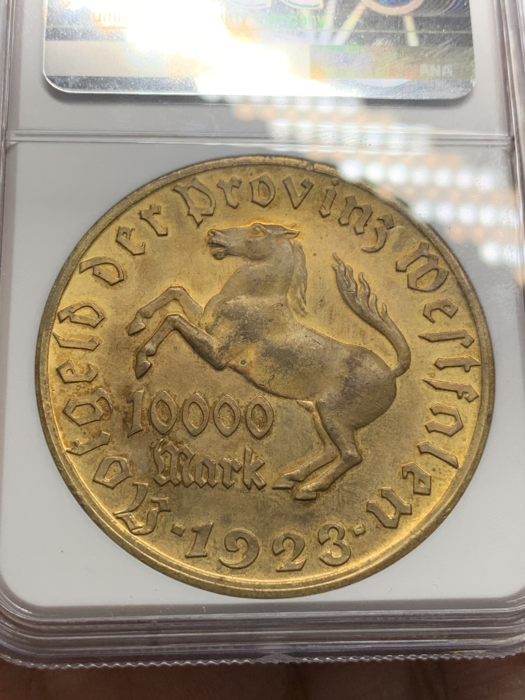 《竞宝斋》第116场-周日，周一 ，2场连拍（全场包邮） NGC MS63 1923年德国德紧时期威斯特法伦10000马克镀金大马币