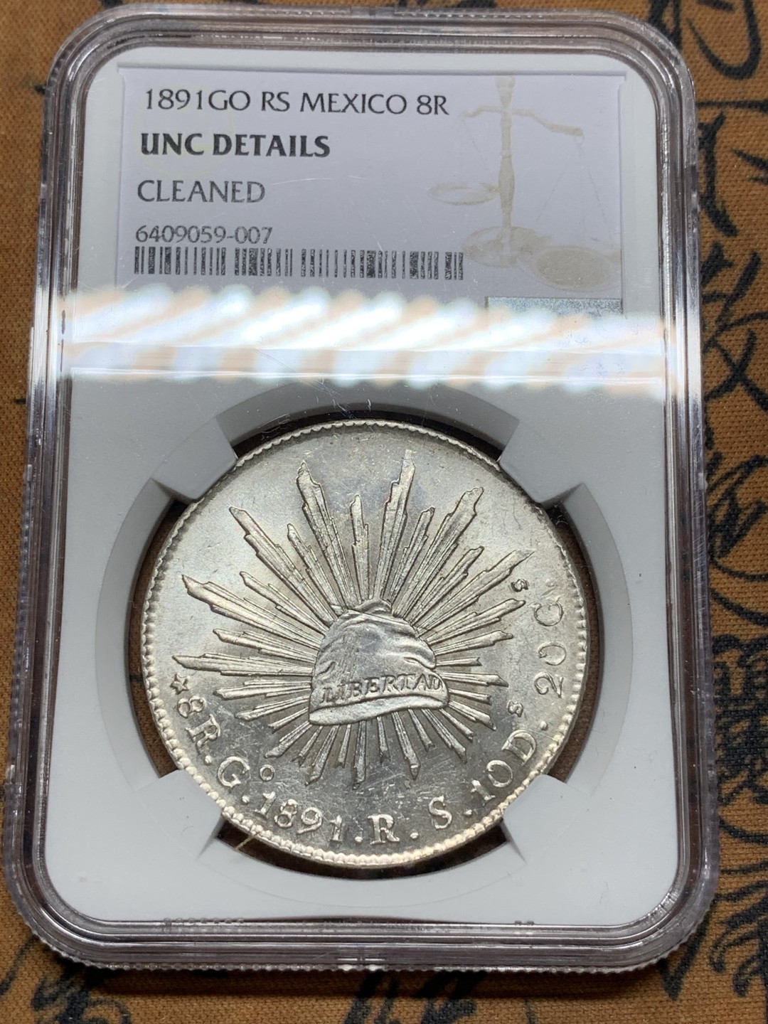 《竞宝斋》第116场-周日，周一 ，2场连拍（全场包邮） NGC UNC 墨西哥 1891年 8R 花边鹰洋 银币 打制压力十足 细节好 全羽不错 光度极好