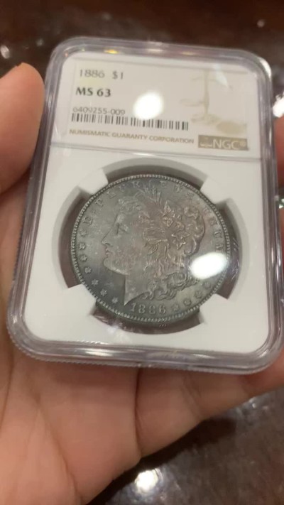 《竞宝斋》第116场-周日，周一 ，2场连拍（全场包邮） NGC-MS63 美国1886年 摩根银币 深绿彩包浆