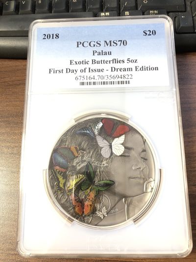 【海寧潮】拍卖第四十九期 - 【海寧潮客户代拍A】帕劳2018年异国情调梦幻蝴蝶5盎司银币PCGS-MS70首期，原盒证书，右下角卡的地方松了，币看着斜的