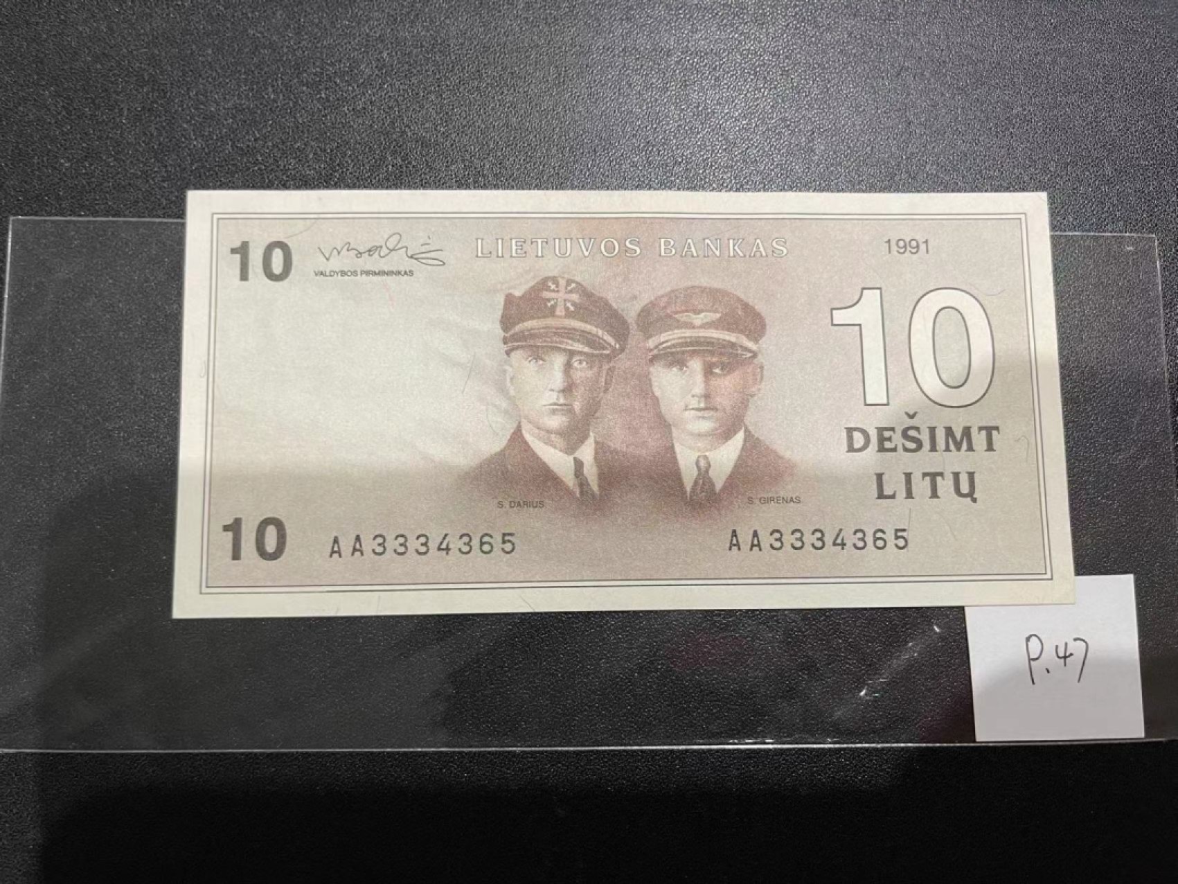 《外钞收藏家》第二百一十八期（波罗的海三国） 立陶宛1991年10立特，AA3334365	P47（意喻两名飞行员生生生是365天的大事） 边角轻微荧光反应 可忽略的 不明显