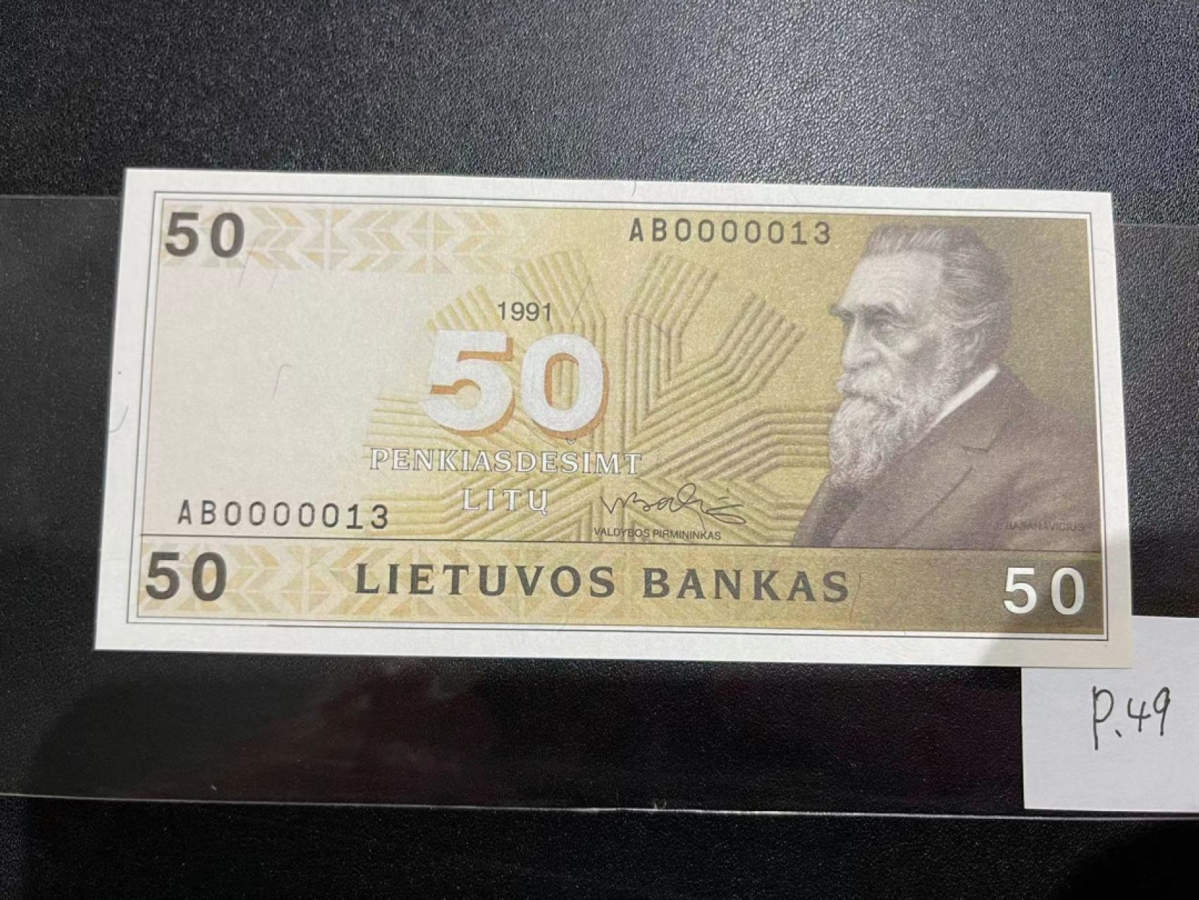 《外钞收藏家》第二百一十八期（波罗的海三国） 立陶宛1991年50立特，AB13号券	P49  全新UNC