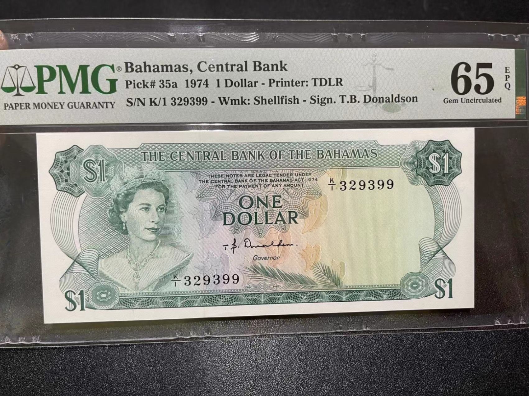 《外钞收藏家》第二百一十九期（三连拍第三场） 1974年巴哈马1刀 PMG65无47尾99