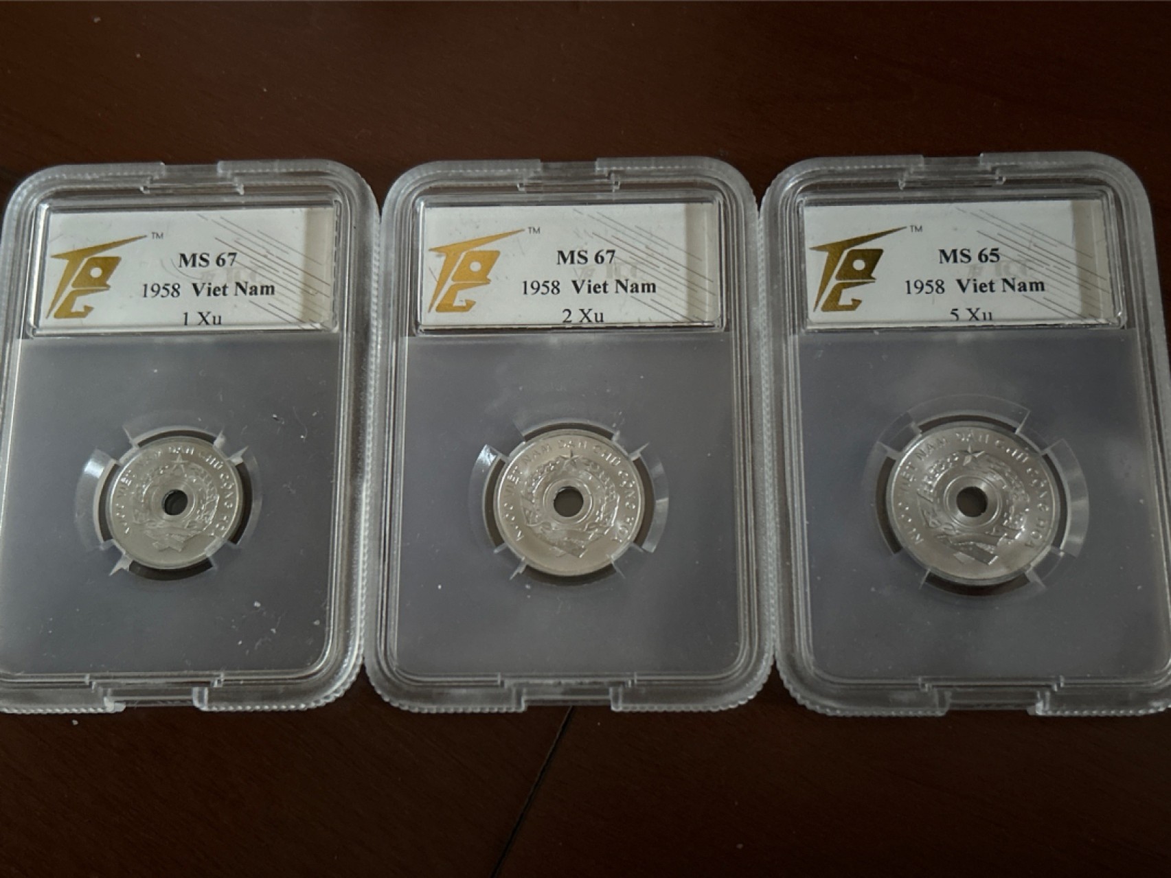 收藏联盟Quantum Auction 第210期拍卖 邮币专场 1958年越南套币 中国代造 TQG评级