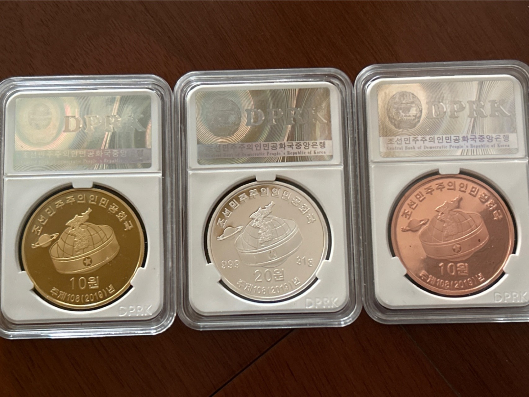 收藏联盟Quantum Auction 第210期拍卖 邮币专场 朝鲜2019年周恩来 紫铜 黄铜 银精制纪念币各一枚