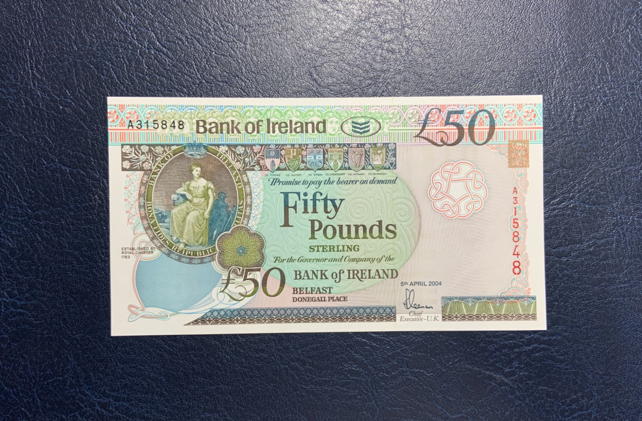 收藏联盟Quantum Auction 第211期拍卖  北爱尔兰银行2004年50镑 品相全新UNC 首发A冠 (正面右下方有一个点钞痕)