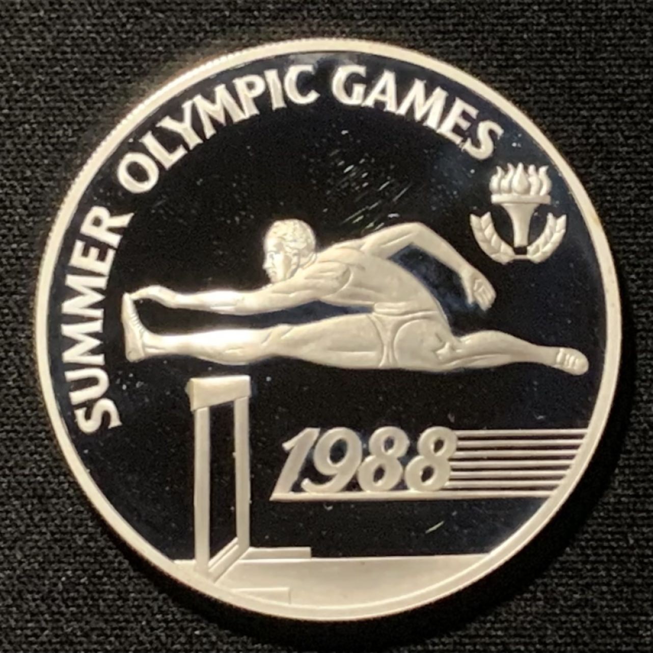 紫瑗钱币——第264期拍卖 巴巴多斯 1988年 汉城奥运会 跨栏 20元 23.33克 0.925银 精制