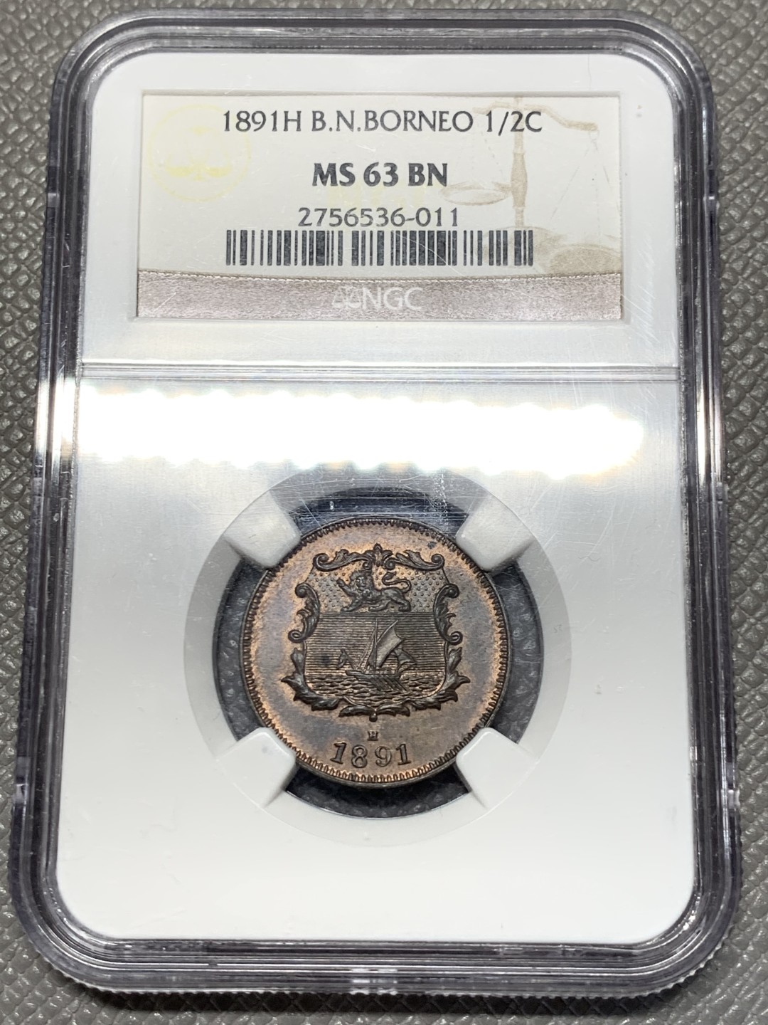 《竞宝斋》第118场-周日，周一 ，2场连拍（全场包邮） NGC-MS63BN 老标 婆罗洲 1891年 洋元半分 狮子五官清晰 漂亮原光铜币！稀缺品种