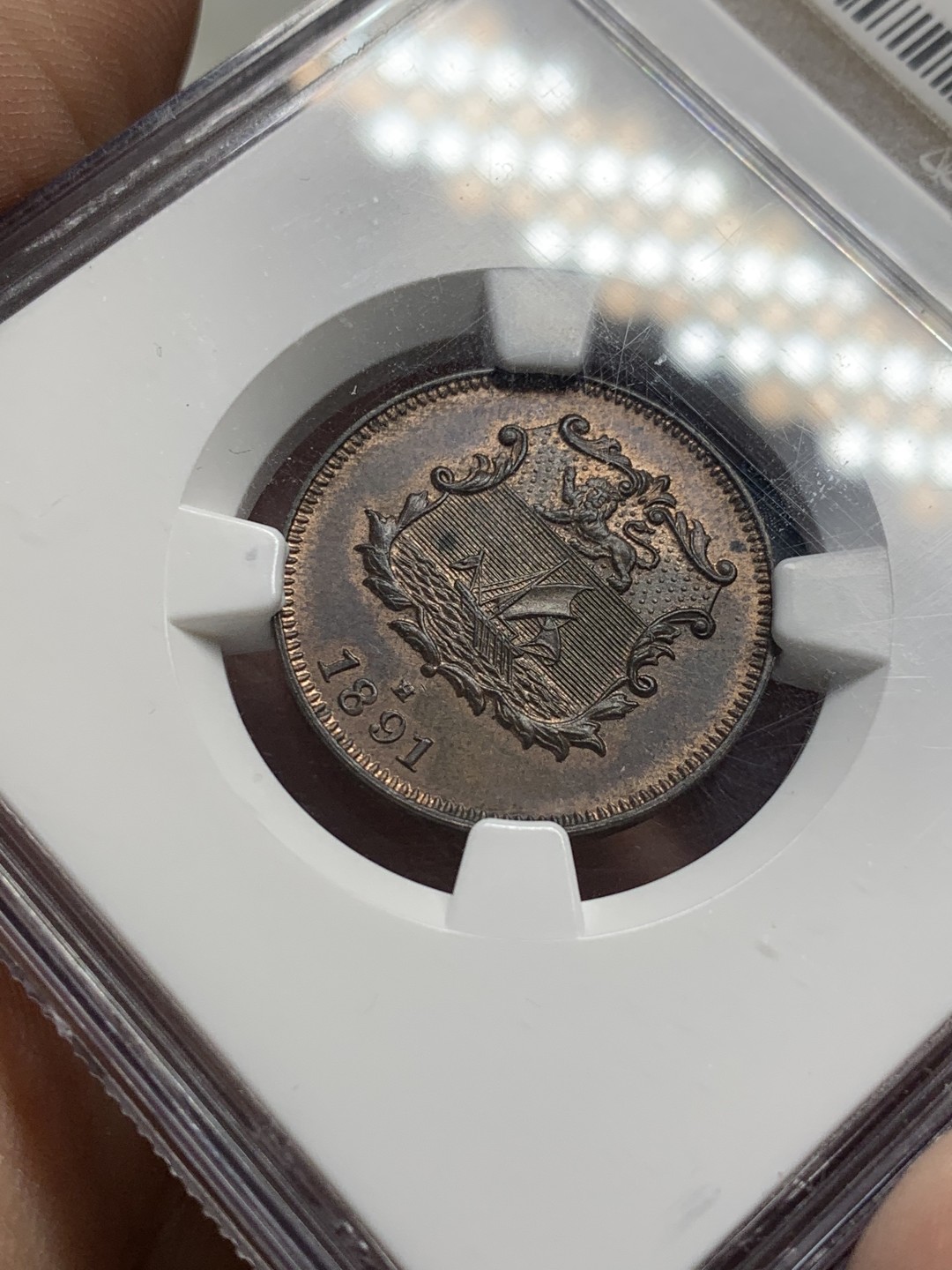 《竞宝斋》第118场-周日，周一 ，2场连拍（全场包邮） NGC-MS63BN 老标 婆罗洲 1891年 洋元半分 狮子五官清晰 漂亮原光铜币！稀缺品种