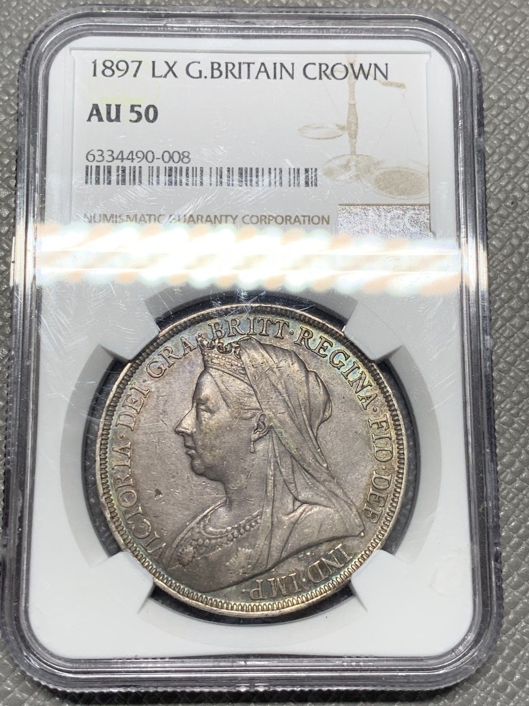 《竞宝斋》第118场-周日，周一 ，2场连拍（全场包邮） NGC AU50 英国 1897年 LX版 披纱 克朗大银币深五彩包浆 很不错