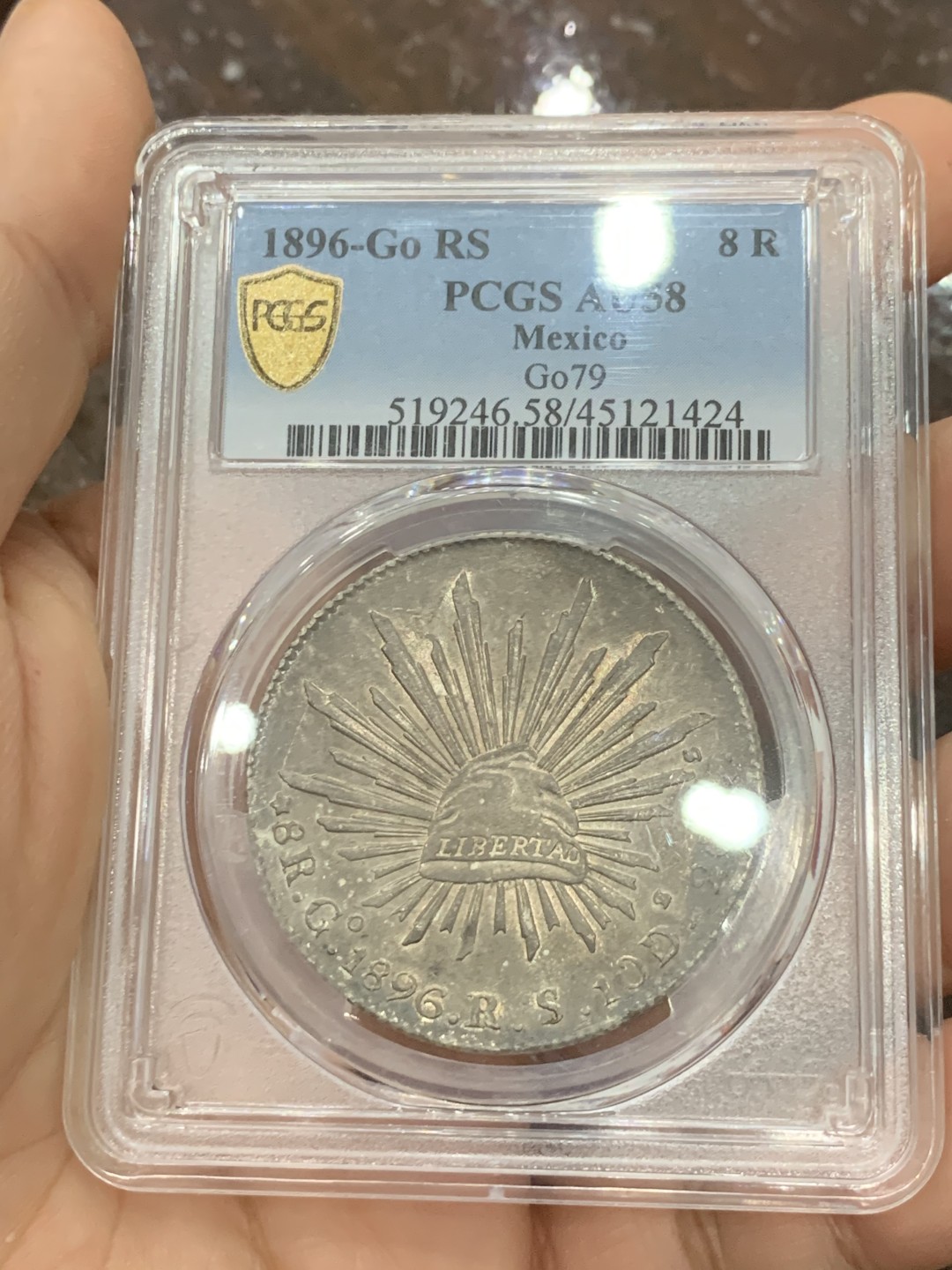 《竞宝斋》第118场-周日，周一 ，2场连拍（全场包邮） PCGS AU58 墨西哥 1896年 GO RS 花边 鹰洋 银币 全羽深包浆 转光好