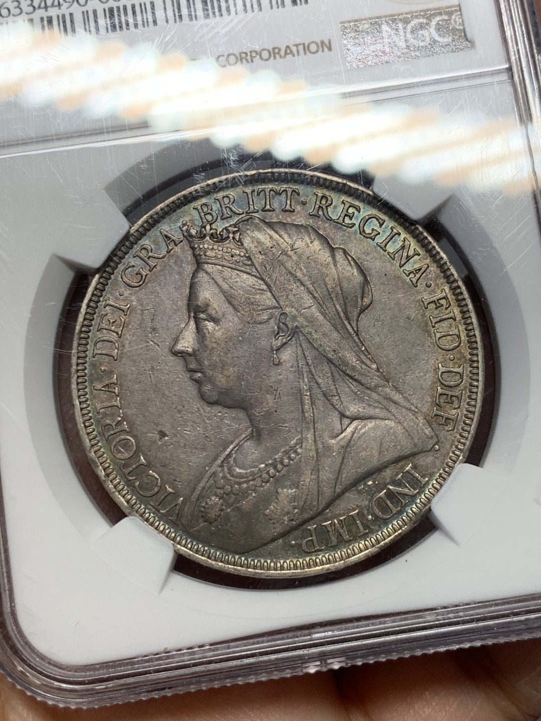 《竞宝斋》第118场-周日，周一 ，2场连拍（全场包邮） NGC AU50 英国 1897年 LX版 披纱 克朗大银币深五彩包浆 很不错