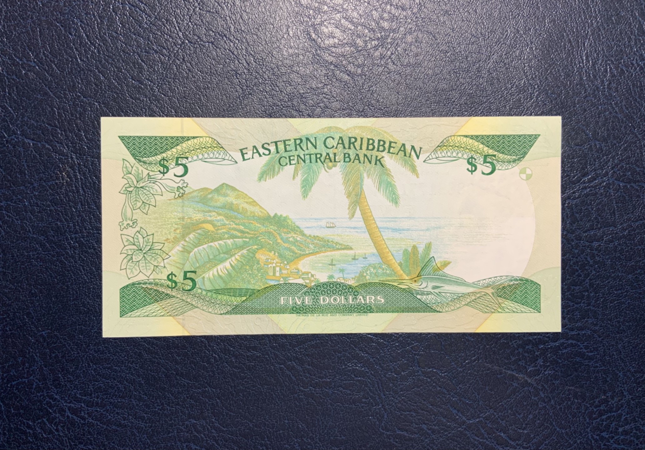 收藏联盟Quantum Auction 第211期拍卖  东加勒比国家1986-88年5元 品相AU- 小彩背