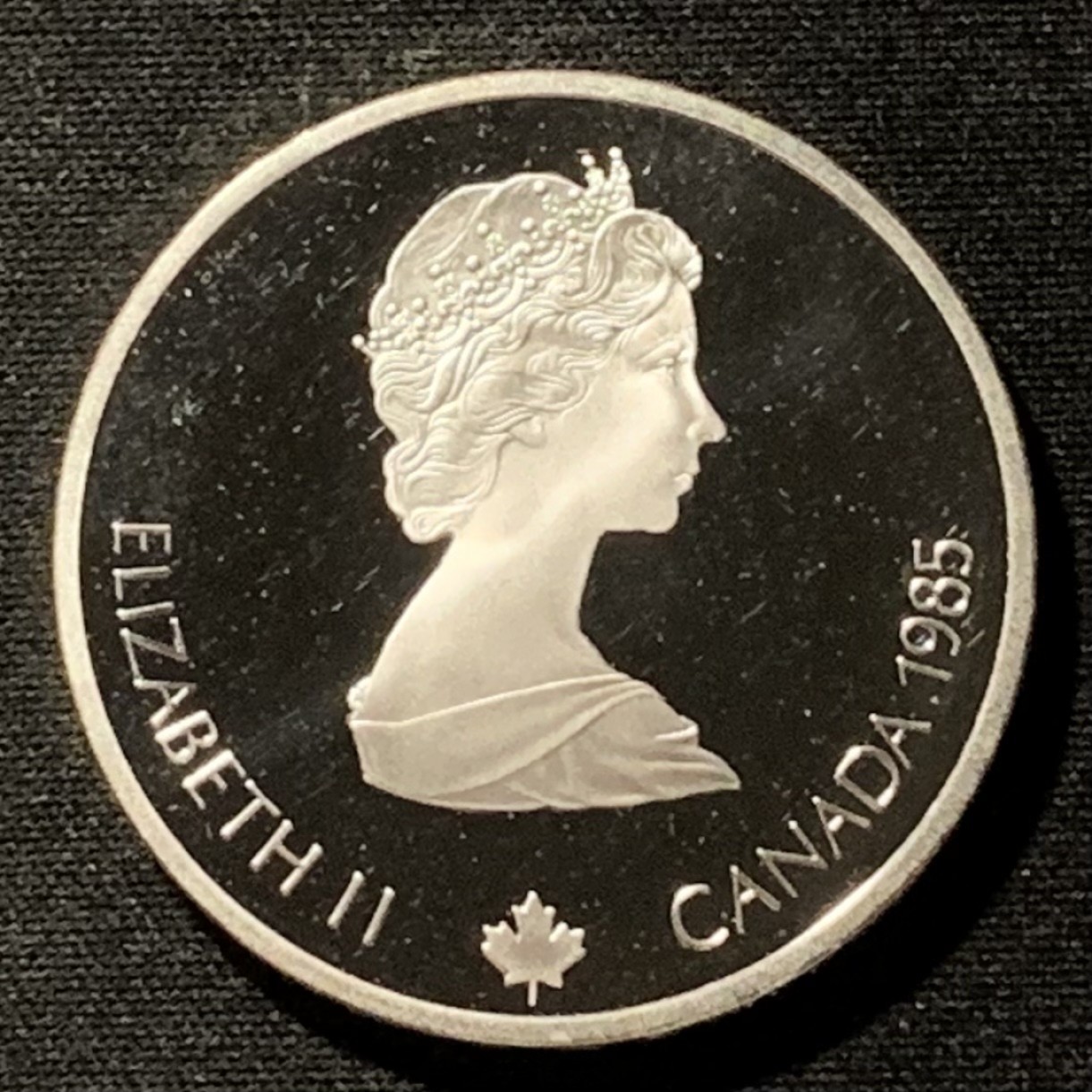 紫瑗钱币——第249期拍卖 加拿大 1985年 卡尔加里冬奥运 短道速滑 20元 银币 34.1克 0.925银 精制 原盒