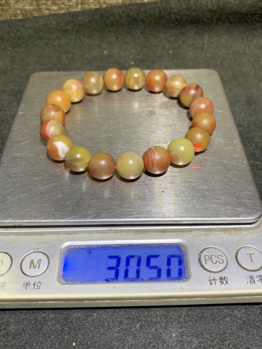 川料南红玛瑙黄皮包浆料手串一条，