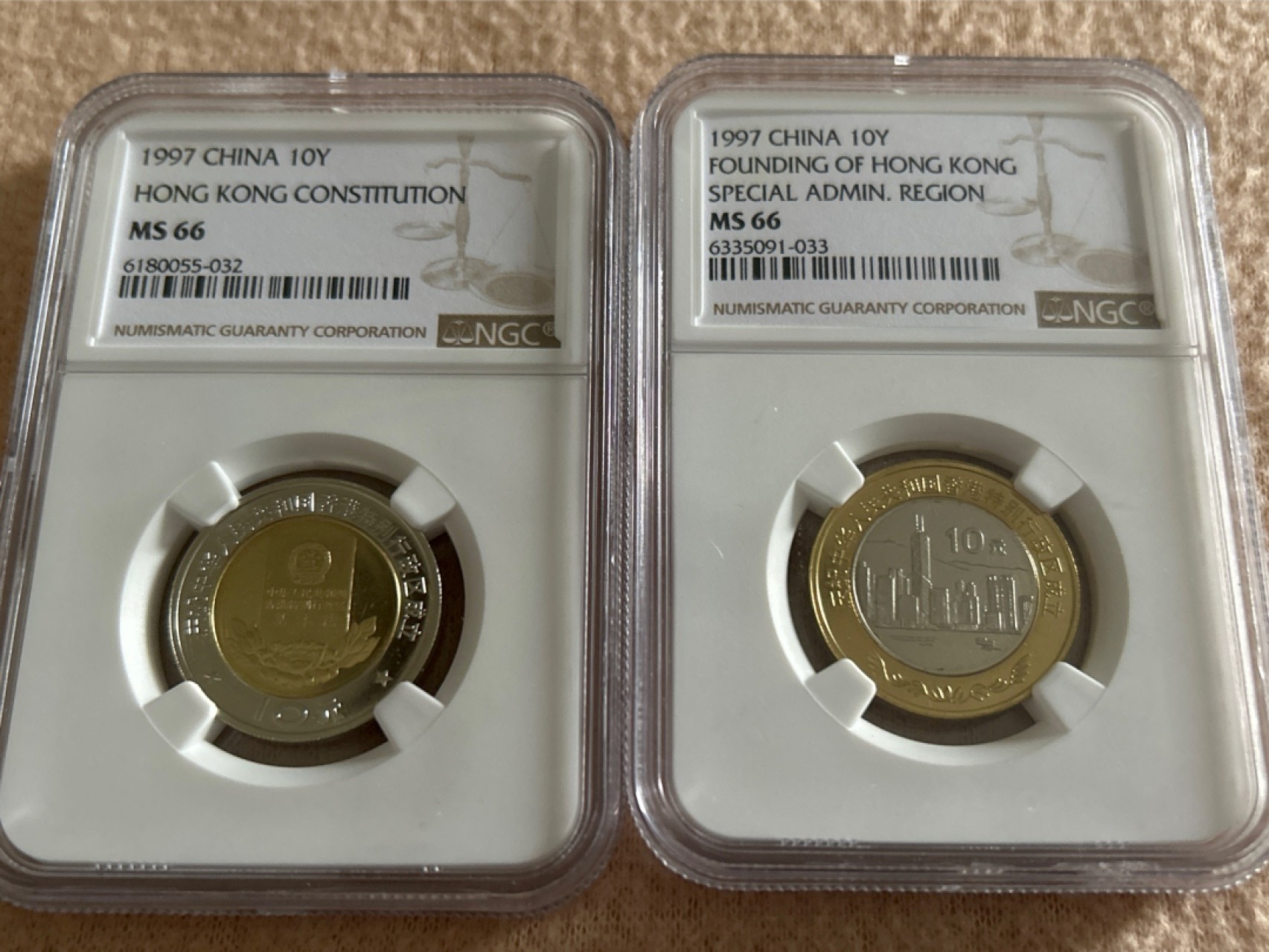收藏联盟Quantum Auction 第214期拍卖 硬币场 1997年香港回归祖国纪念币一对 NGC MS66同分