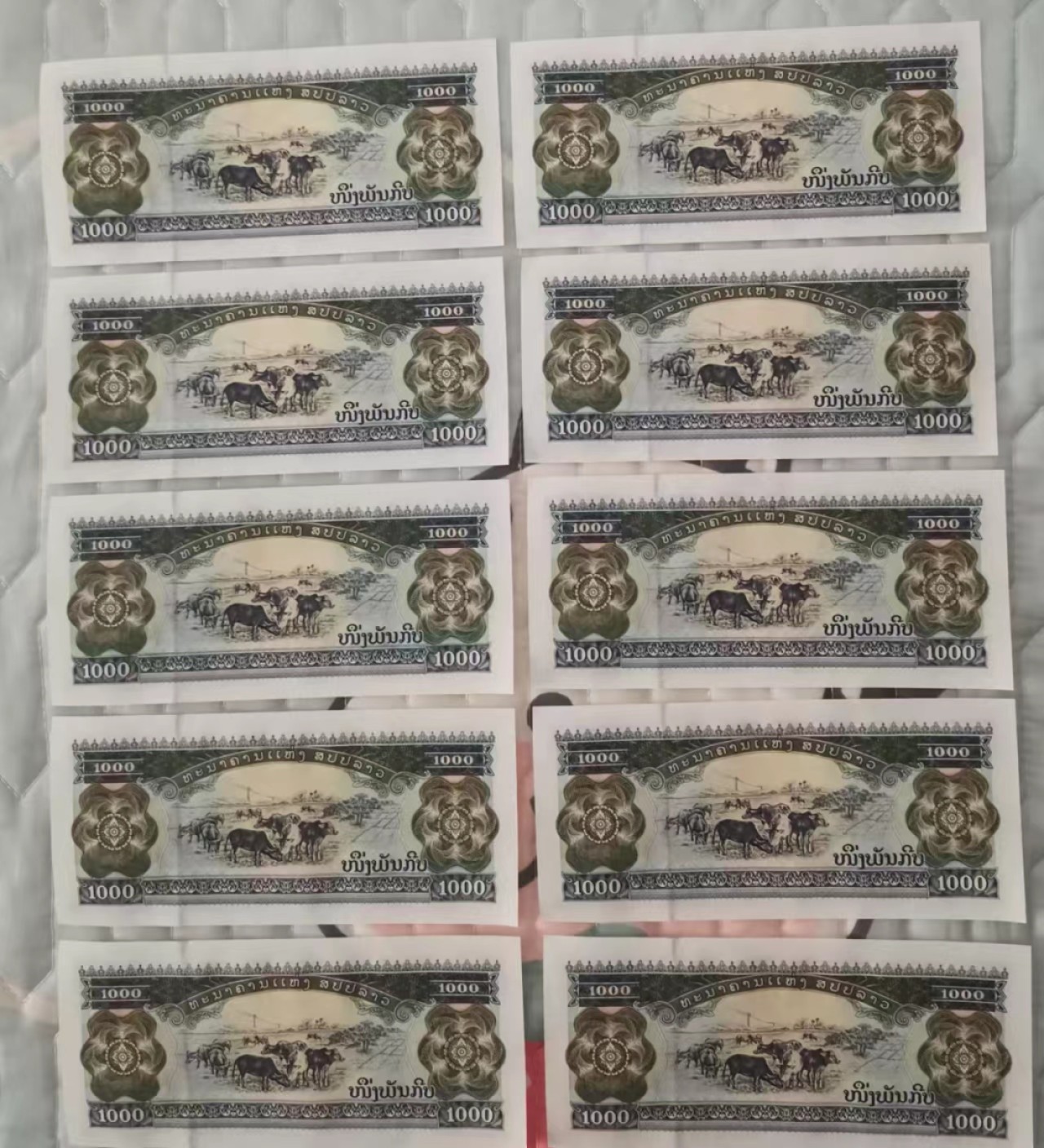 世家收藏第十八期“世界杯”号邮票钱币专场（自动截拍） 【补号】老挝2003年版1000基普纸钞一组10张连号UNC全新（罕见的补号ZE冠字）