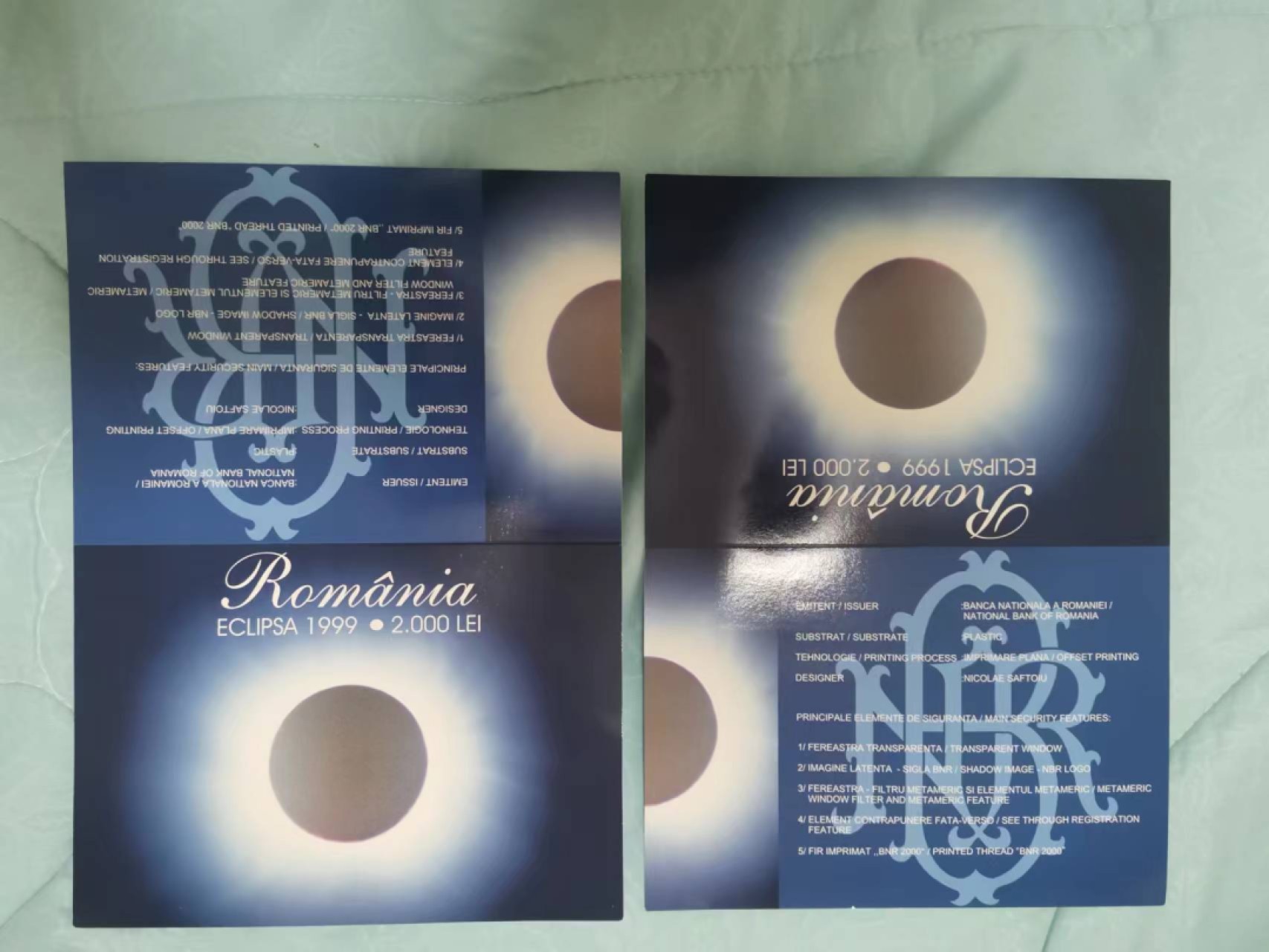 世家收藏第十八期“世界杯”号邮票钱币专场（自动截拍） 罗马尼亚1999年版2000列伊日全食塑料纪念钞UNC全新（带原装册子，首发冠字001A）