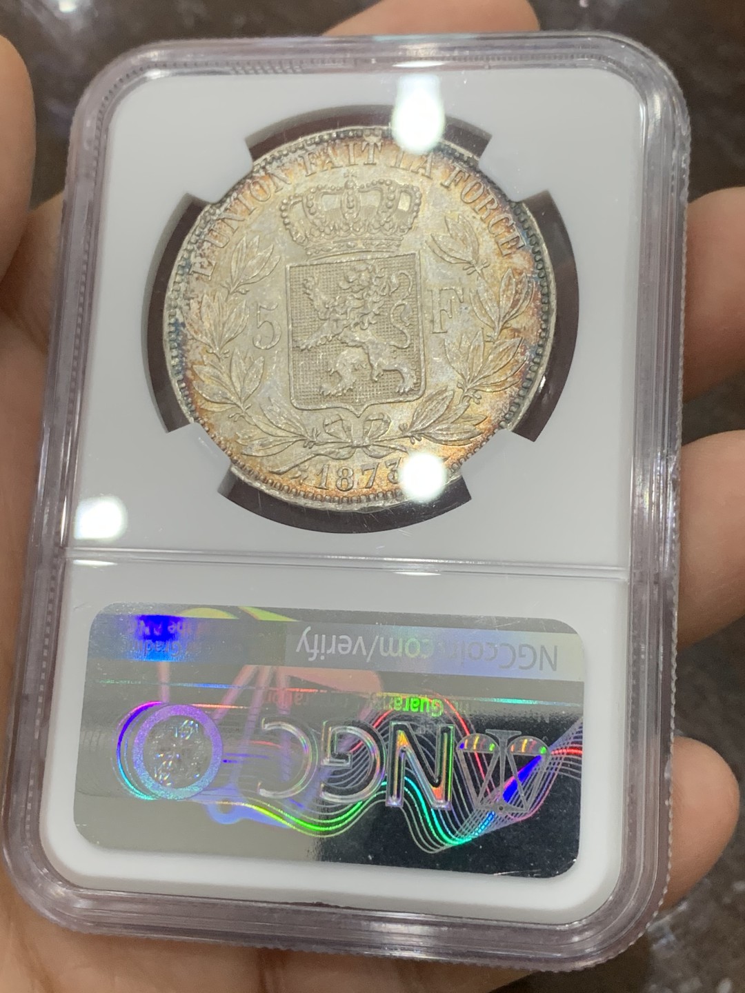 《竞宝斋》第121场-周日，周一 ，2场连拍（全场包邮） NGC-MS62 比利时1873年利奥波德二世5法郎大银币 正面全五彩 背面黄油转光 真正意义上的五彩 美轮美奂