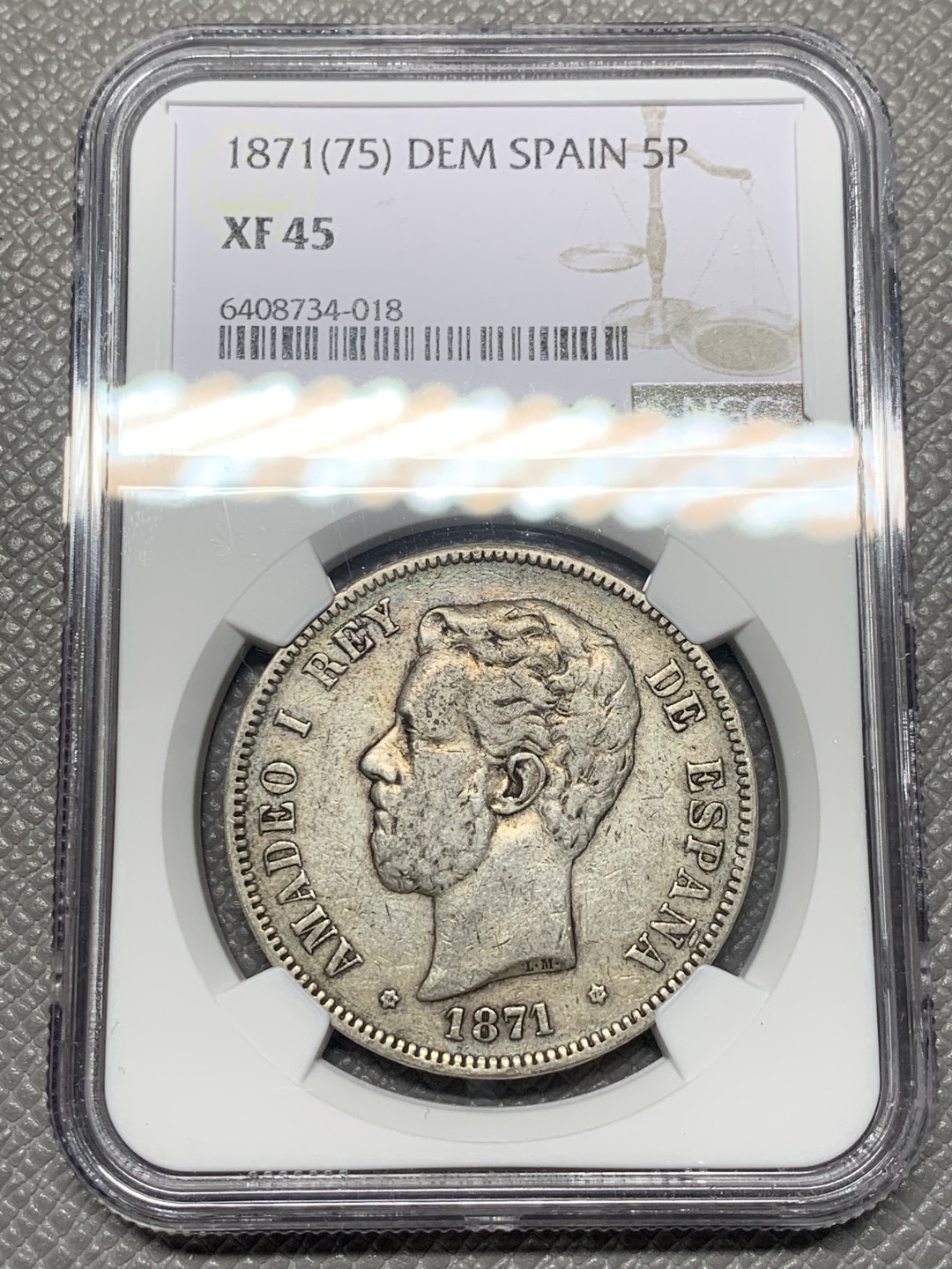 《竞宝斋》第121场-周日，周一 ，2场连拍（全场包邮） NGC-XF45 西班牙1871年 阿玛德欧老头像 5比塞塔双柱银币 原味好品