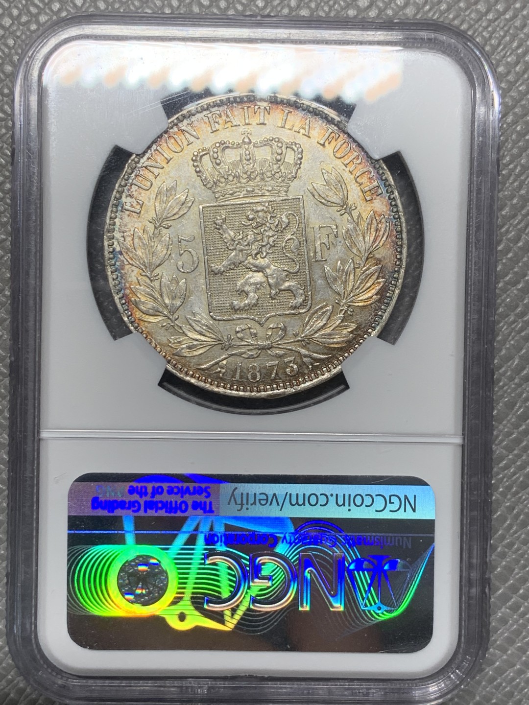 《竞宝斋》第121场-周日，周一 ，2场连拍（全场包邮） NGC-MS62 比利时1873年利奥波德二世5法郎大银币 正面全五彩 背面黄油转光 真正意义上的五彩 美轮美奂