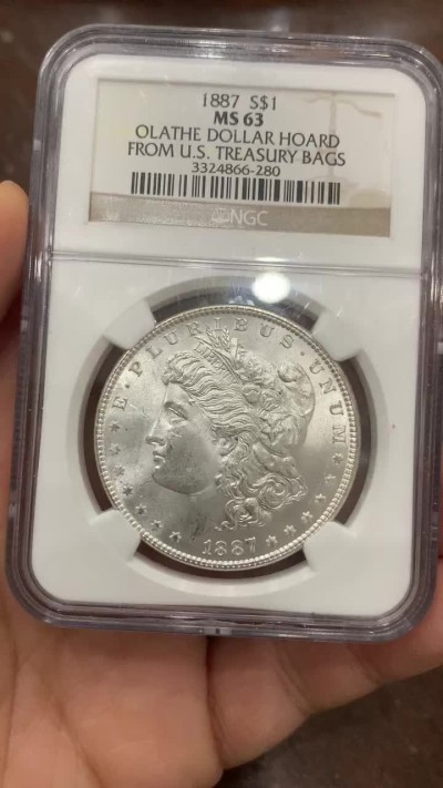 《竞宝斋》第121场-周日，周一 ，2场连拍（全场包邮） NGC MS63 美国 1887年 摩根1美元银币 该币来自美国财政部国库储备 比较有意义 状态参数见币