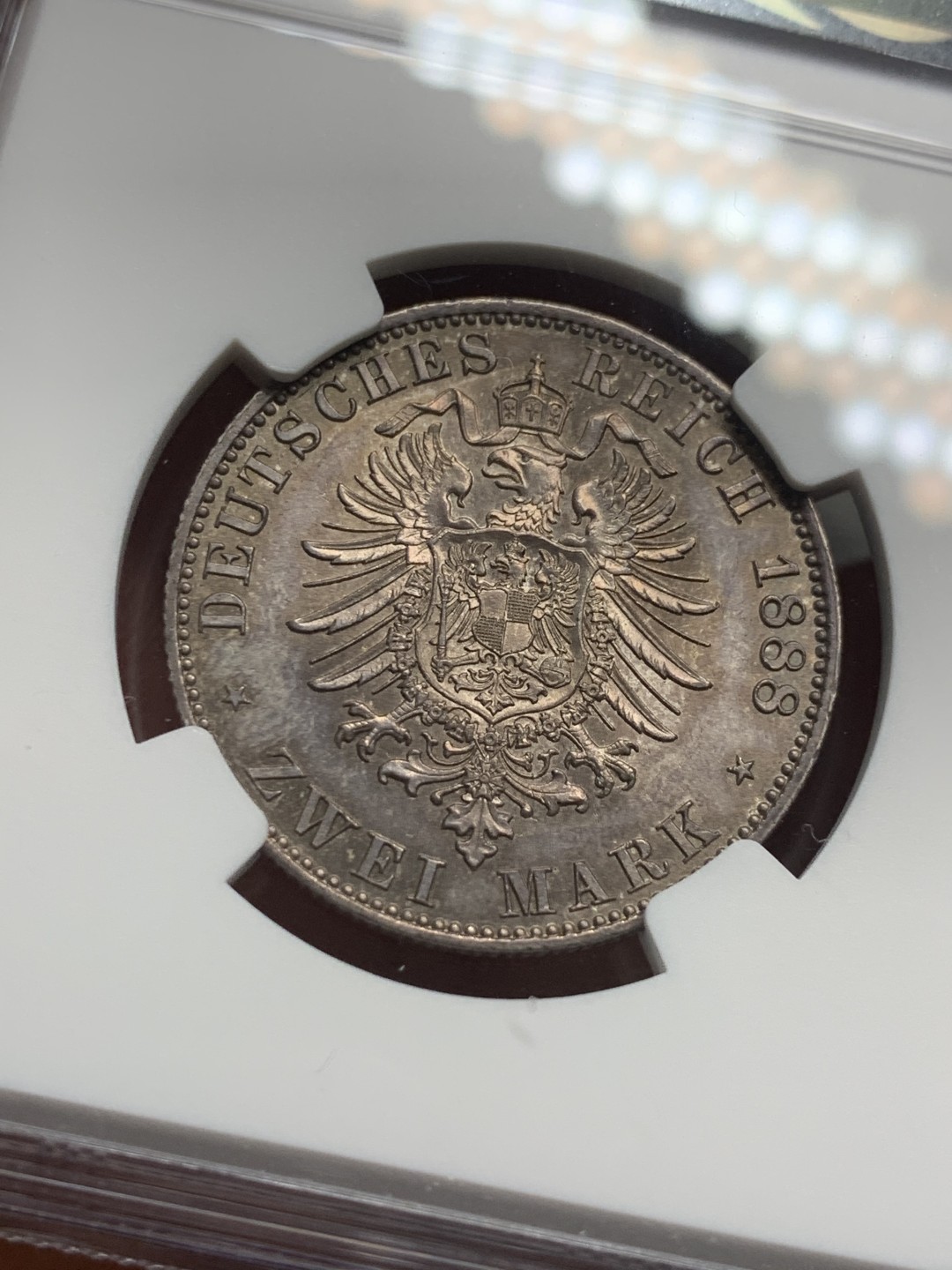 《竞宝斋》第121场-周日，周一 ，2场连拍（全场包邮） NGC-MS62 德国普鲁士 1888年 三皇之年2马克银币 经典纸袋包浆 非常漂亮