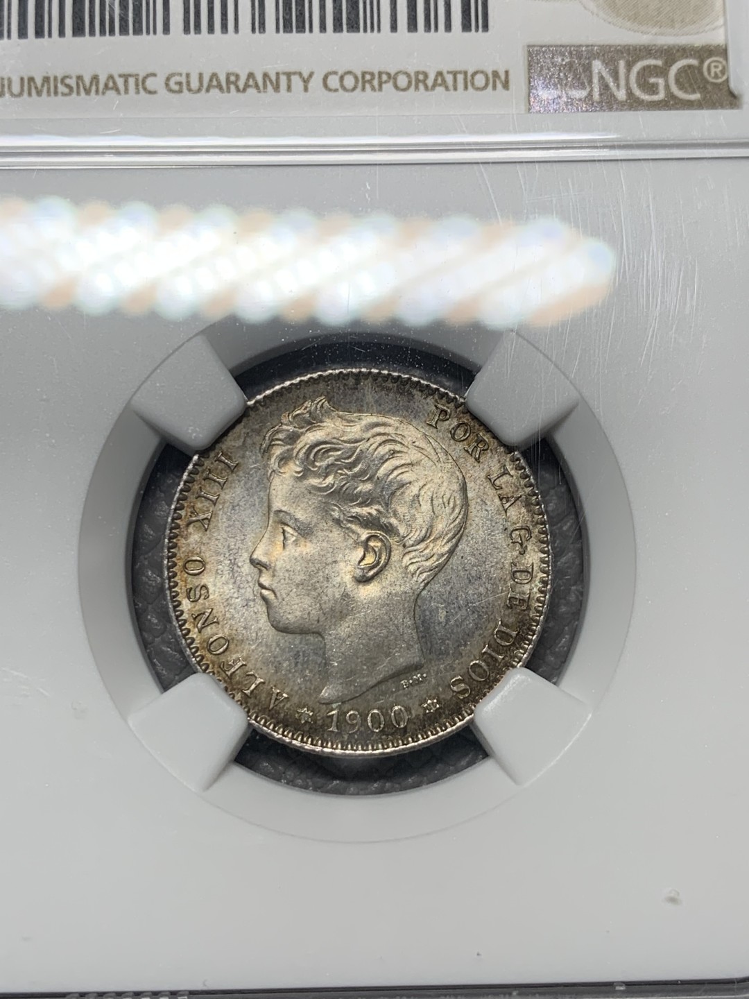 《竞宝斋》第121场-周日，周一 ，2场连拍（全场包邮） NGC MS63 西班牙 1900 阿方索十三世 1比塞塔 银币 正反深五彩 比起5P 少见太多 这枚太漂亮