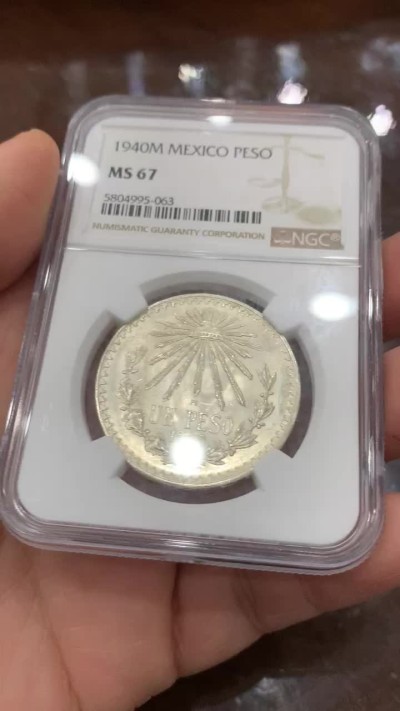 《竞宝斋》第123场-周日，周一 ，2场连拍（全场包邮） NGC-MS67收藏级高分 墨西哥 1940年 1比索鹰洋 银币  sbp于2021年当季拍卖中拍出过1200美元的价格 正价在2000左右