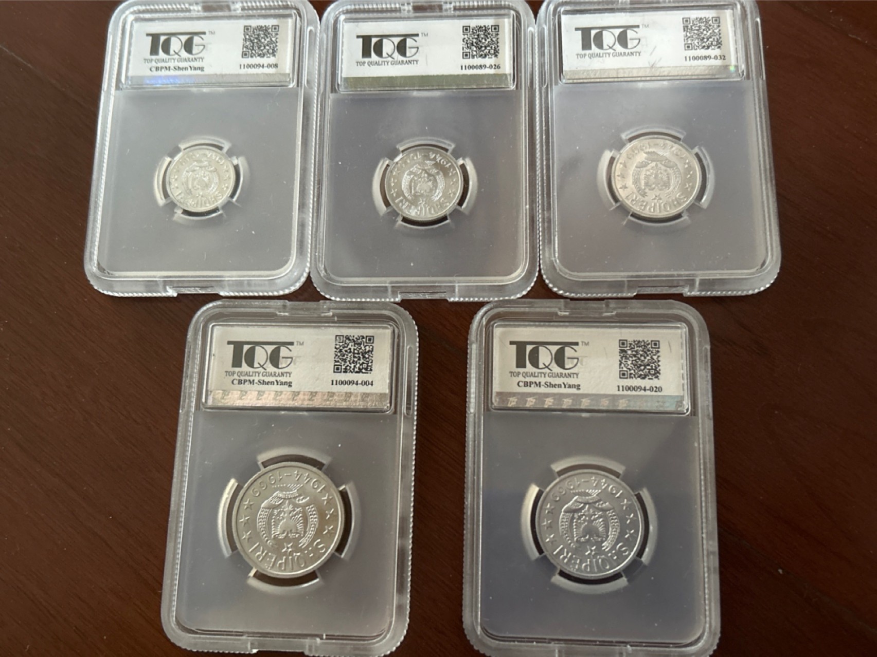 收藏联盟Quantum Auction 第218期拍卖 邮币杂项场 1969年阿尔巴尼亚 解放25周年纪念币 1套5枚 中国代造 TQG评级