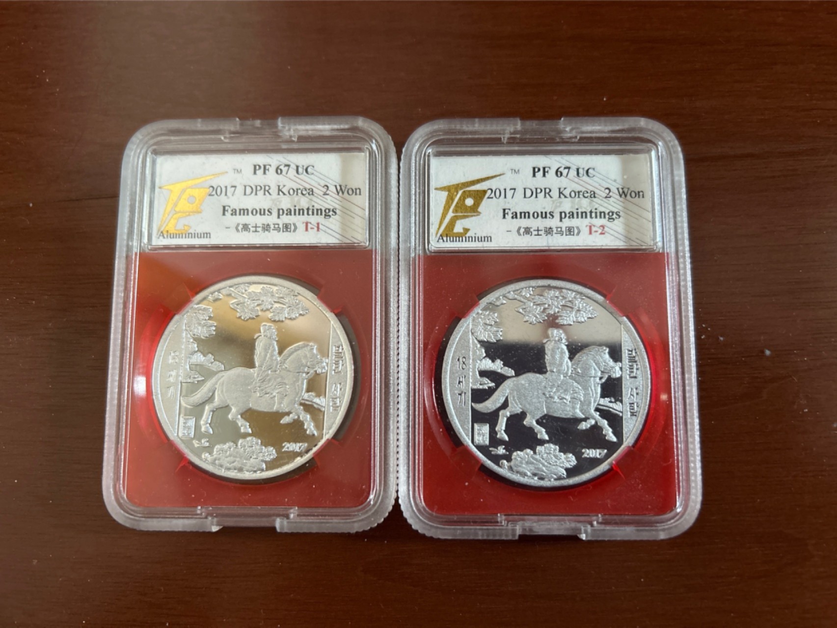 收藏联盟Quantum Auction 第218期拍卖 邮币杂项场 2017年朝鲜 名画系列 《高士骑马图》纪念币 铝币 小字版+大字版一对2枚 TQG PF67UC