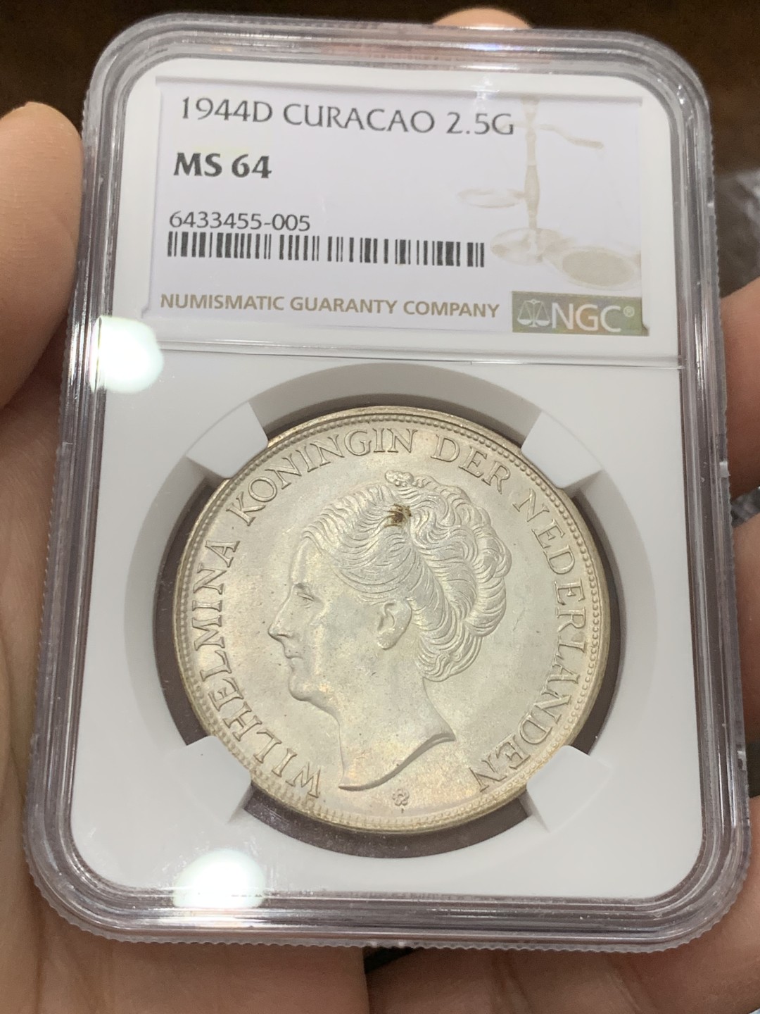 《竞宝斋》第123场-周日，周一 ，2场连拍（全场包邮） NGC-MS64 荷属库拉索 1944年 2.5盾银币  光度极佳，底板洁净。铸造量20万枚，仅为荷属东印度十分之一。殖民地品种已经开始涨起来了。
