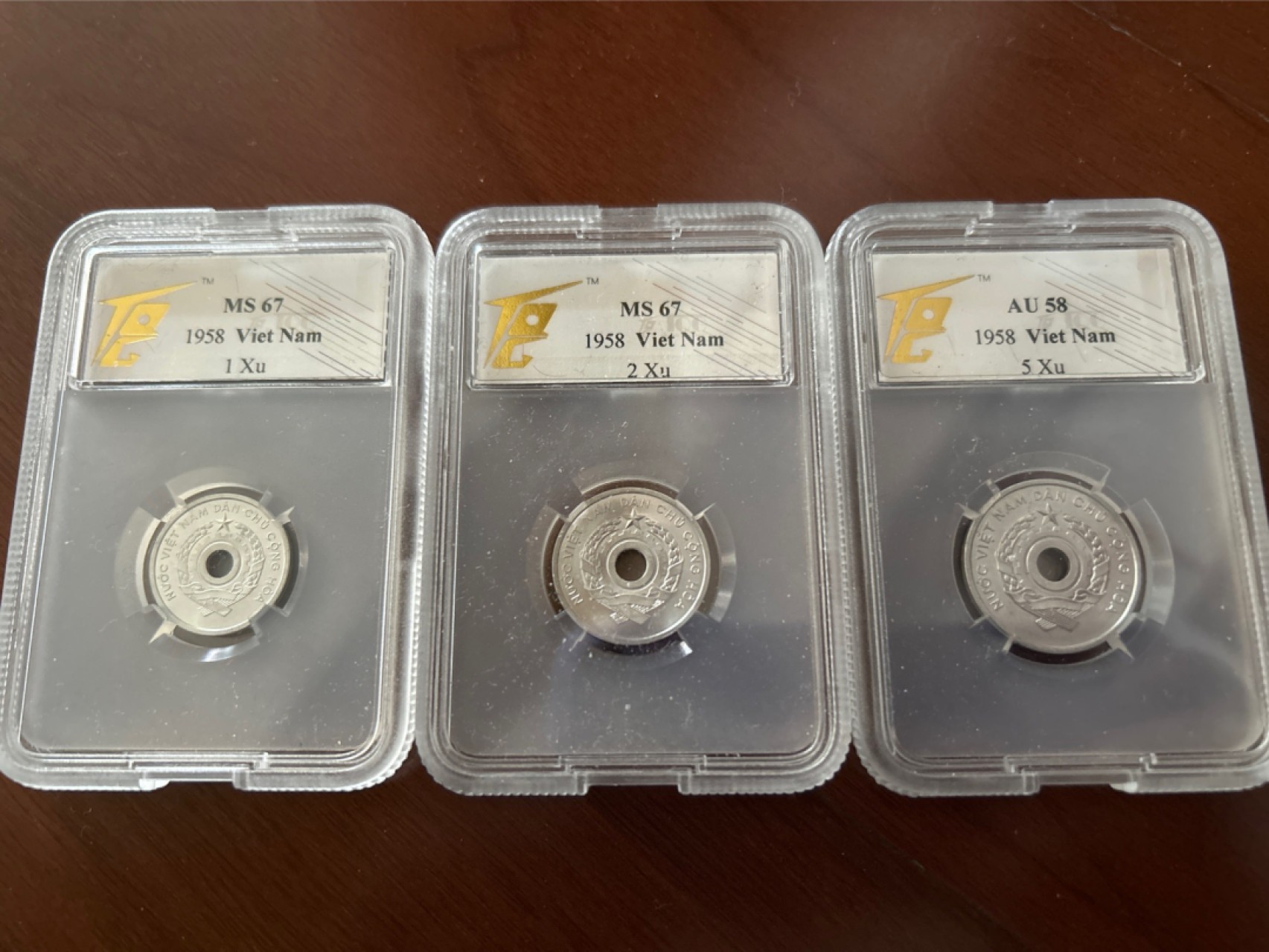 收藏联盟Quantum Auction 第218期拍卖 邮币杂项场 1958年越南套币 中国代造 TQG评级