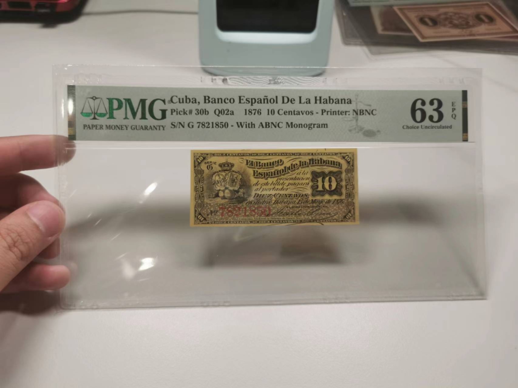 35.【鲸贝乐淘★两拍包邮】道德经·第“是以圣人后其身而身先，外其身而身存”号拍卖 【冠军分★古巴🇨🇺★唯一评级记录】1876年10分，百年老钞文物典藏，PMG63E