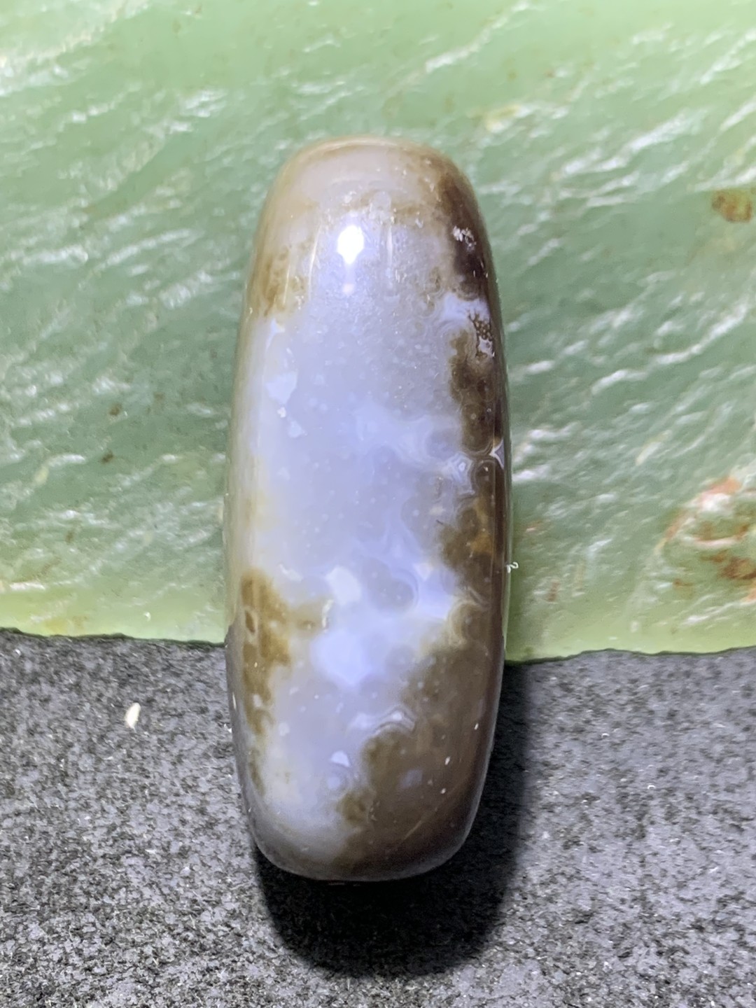 精美高玉化药师玛瑙天眼板珠(背云)一个，