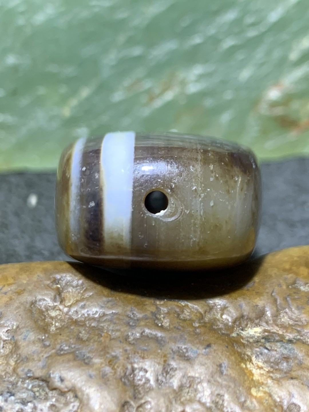精美高玉化药师玛瑙天眼板珠(背云)一个，