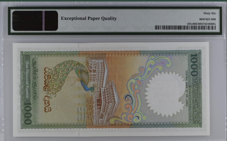收藏联盟Quantum Auction 第220期拍卖  斯里兰卡1990年1000卢比 PMG66 荧光孔雀王