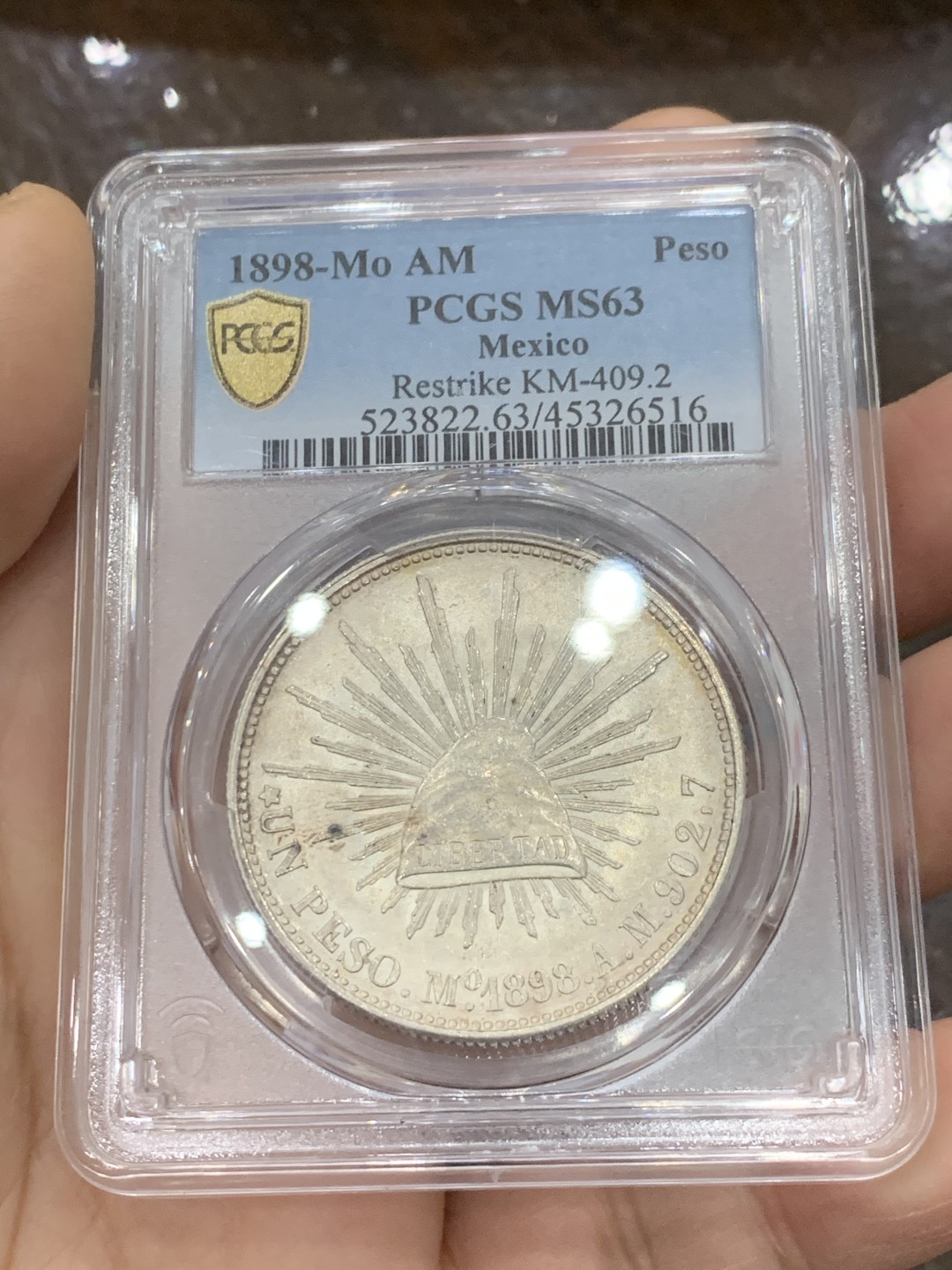 《竞宝斋》第125场-周日，周一 ，2场连拍（全场包邮） PCGS MS63 墨西哥 1898年 直边鹰洋 大银币 状态好 转光明显（资料显示该版本为1949年铸造）