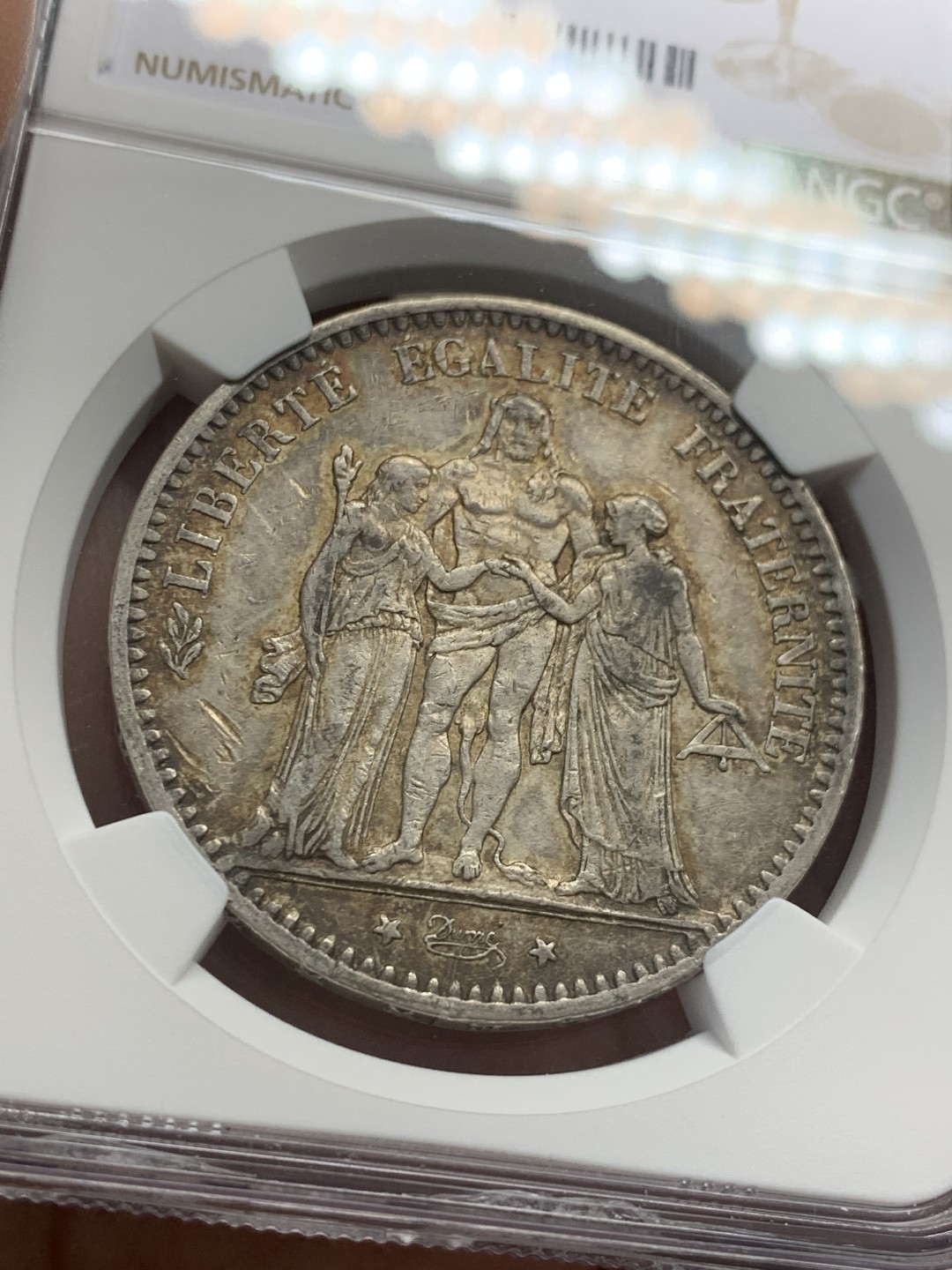 《竞宝斋》第125场-周日，周一 ，2场连拍（全场包邮） NGC AU 法国 1875年 大力神 5法郎银币 深包浆 小A版 不多的年份