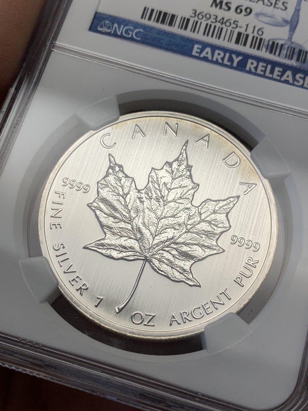 《竞宝斋》第125场-周日，周一 ，2场连拍（全场包邮） NGC-MS69 2013年加拿大1盎司枫叶银币 首期蓝标 1盎司 31.1克 9999银