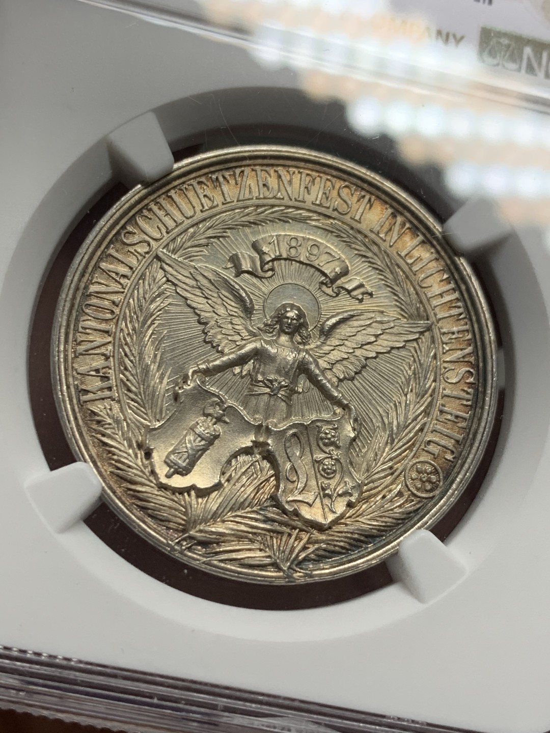 《竞宝斋》第125场-周日，周一 ，2场连拍（全场包邮） NGC-MS64 瑞士1897年射击节 正面天使背狗狗图案 大银章 系列里的难点 非常漂亮