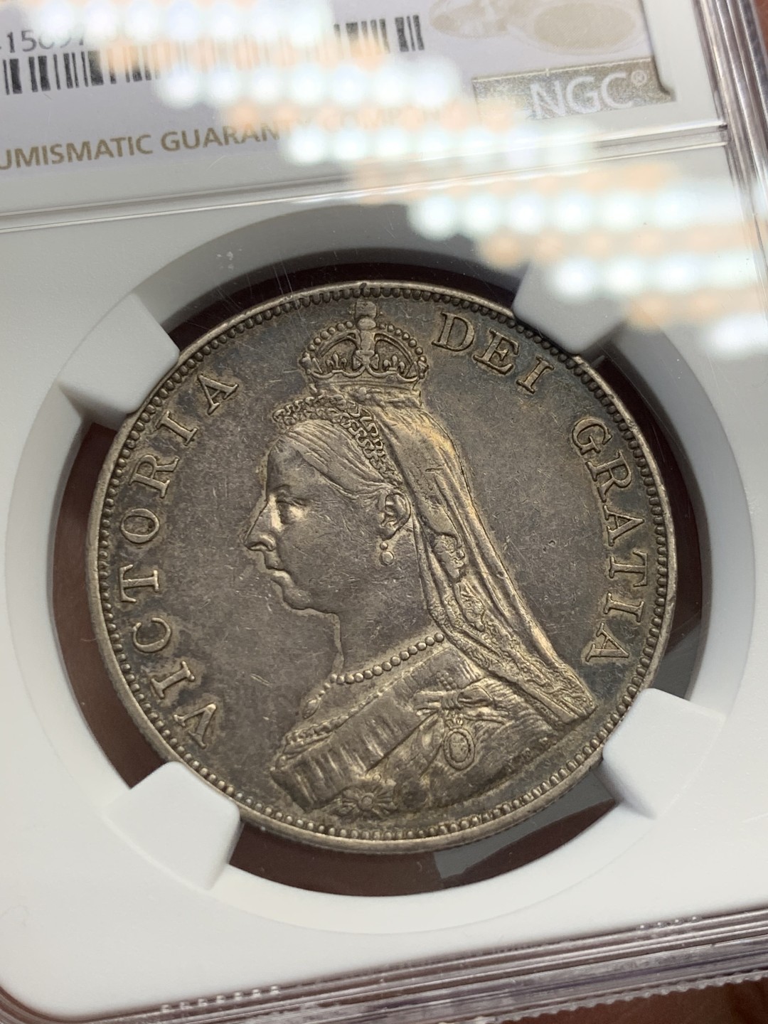 《竞宝斋》第125场-周日，周一 ，2场连拍（全场包邮） NGC AU50 英国1887年维多利亚高冠双弗洛林大银币黑彩阿拉伯体