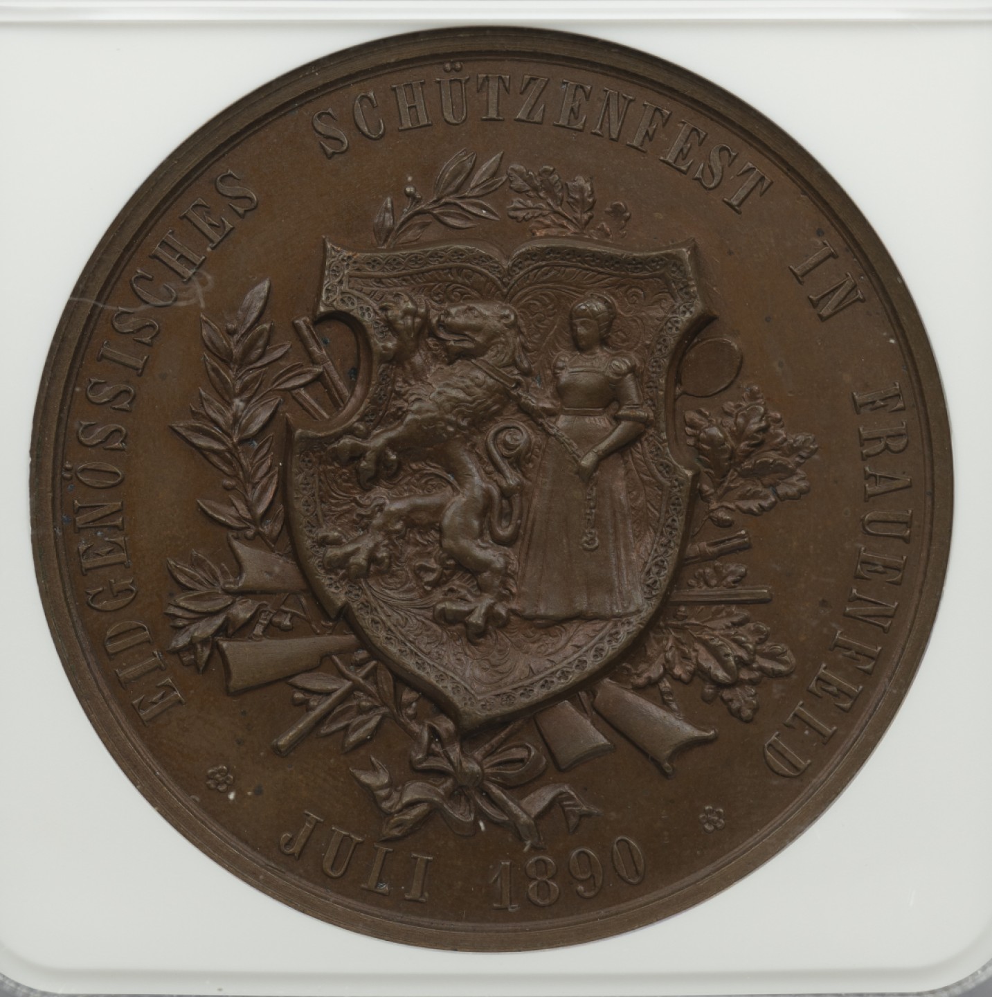 万国钱币拍卖第003期（圣诞精品特拍） 瑞士1890劳芬恩菲尔德射击节铜章，高点俱在，雕刻精美，难得的高分品相，加厚盒。