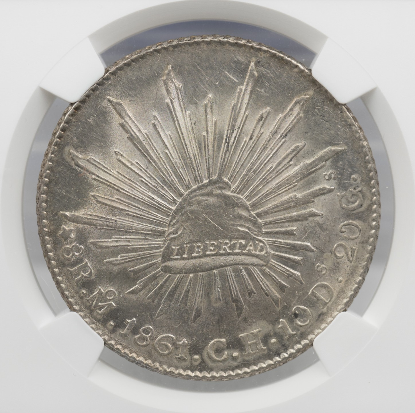 万国钱币拍卖第003期（圣诞精品特拍） 墨西哥1861年MO CH 花边鹰洋8R，中期版本，好品少，底光好，62分已是第四名分数。