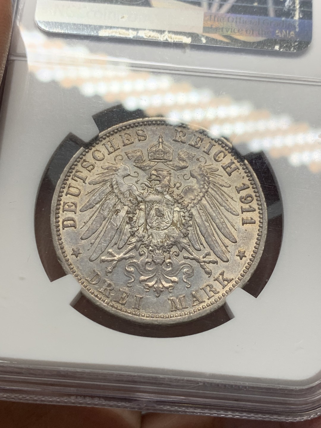 《竞宝斋》第128场-周日，周一 ，2场连拍（全场包邮） NGC-AUD 德国 1911年 巴登3马克银币 带淡黄油包浆 光度不错